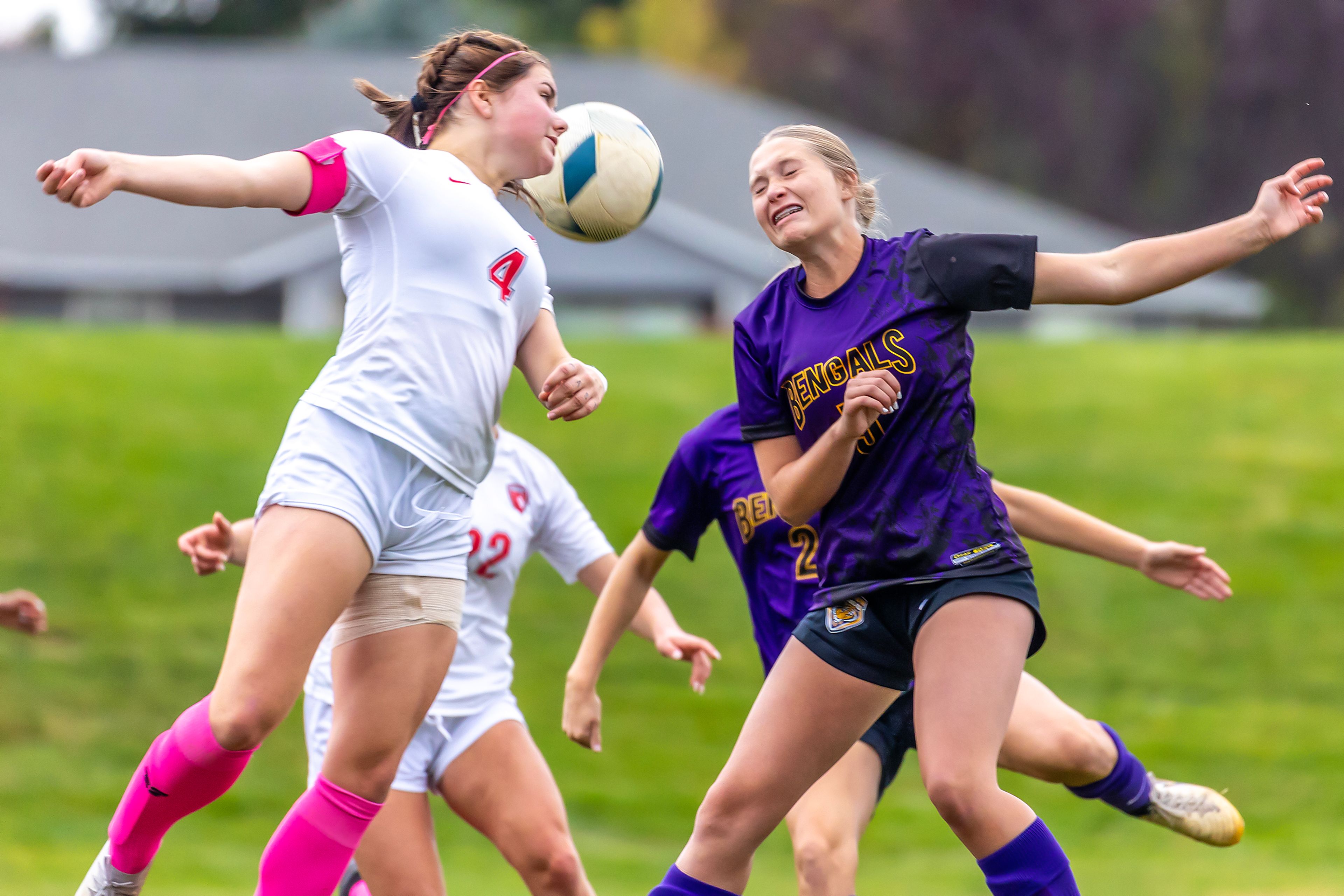 Lewiston�s Sophia Thompson and Sandpoint�s Maddie Mitchell compete to head the ball in the 5A Inland Empire League District Championship Wednesday at Walker Field in Lewiston.,