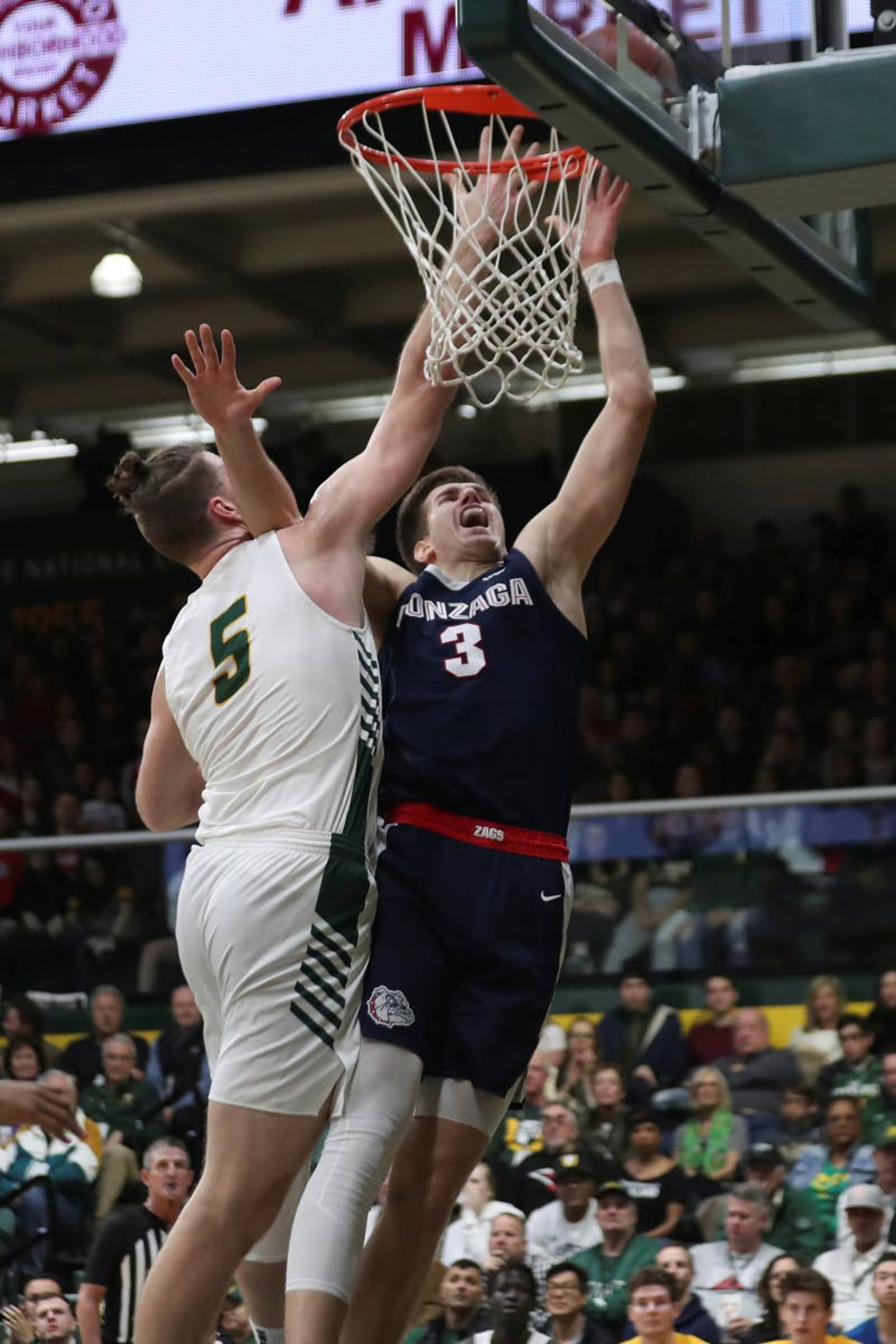 Gonzaga forward Filip Petrusev (3) shoots against San Francisco center Jimbo Lull (5) during the first half of an NCAA college basketball game in San Francisco, Saturday, Feb. 1, 2020. (AP Photo/Jed Jacobsohn)