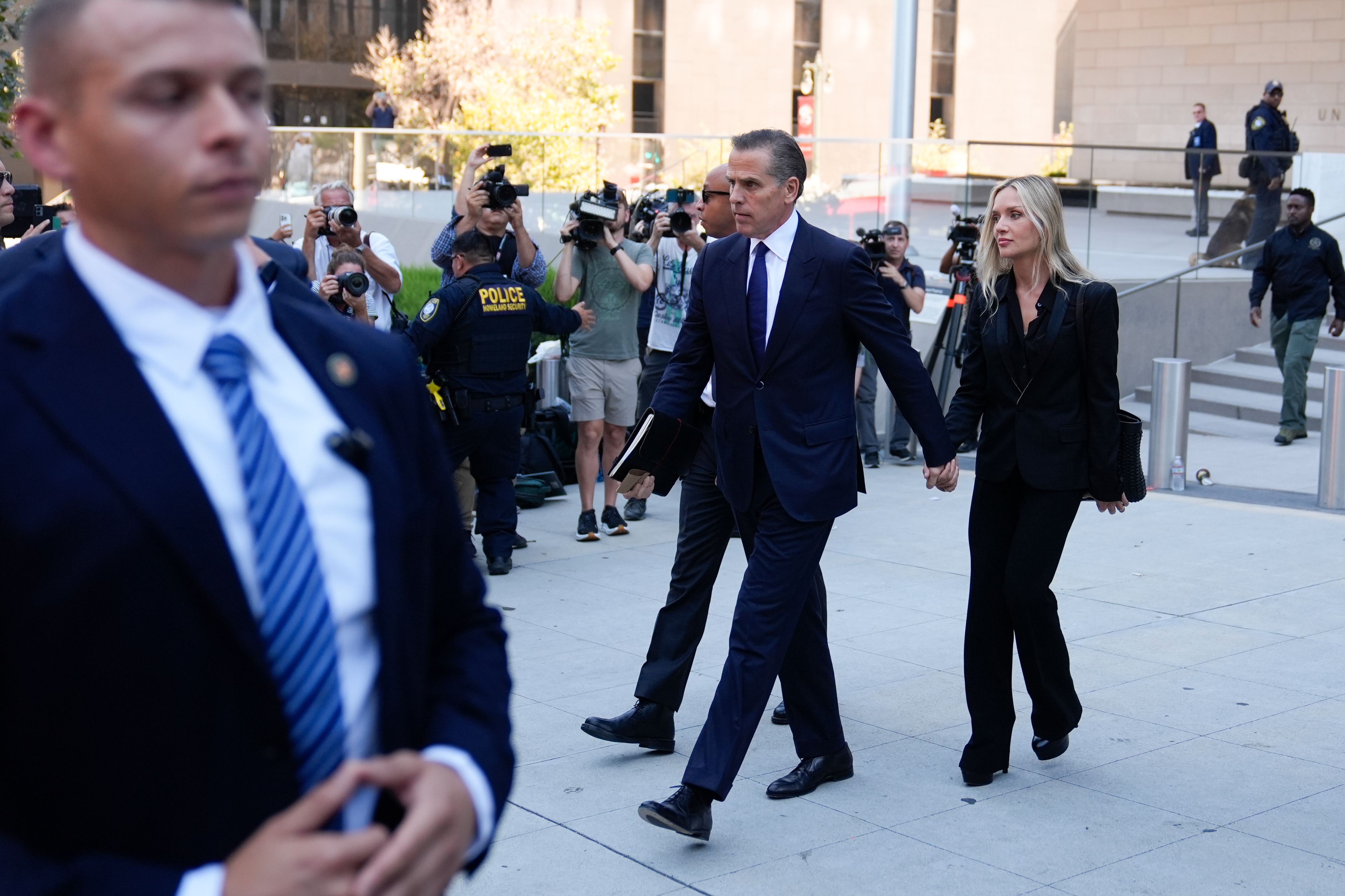 Hunter Biden leaves federal court with his wife Melissa Cohen Biden after pleading guilty in his felony federal tax case, Thursday, Sept. 5, 2024, in Los Angeles. (AP Photo/Jae C. Hong)