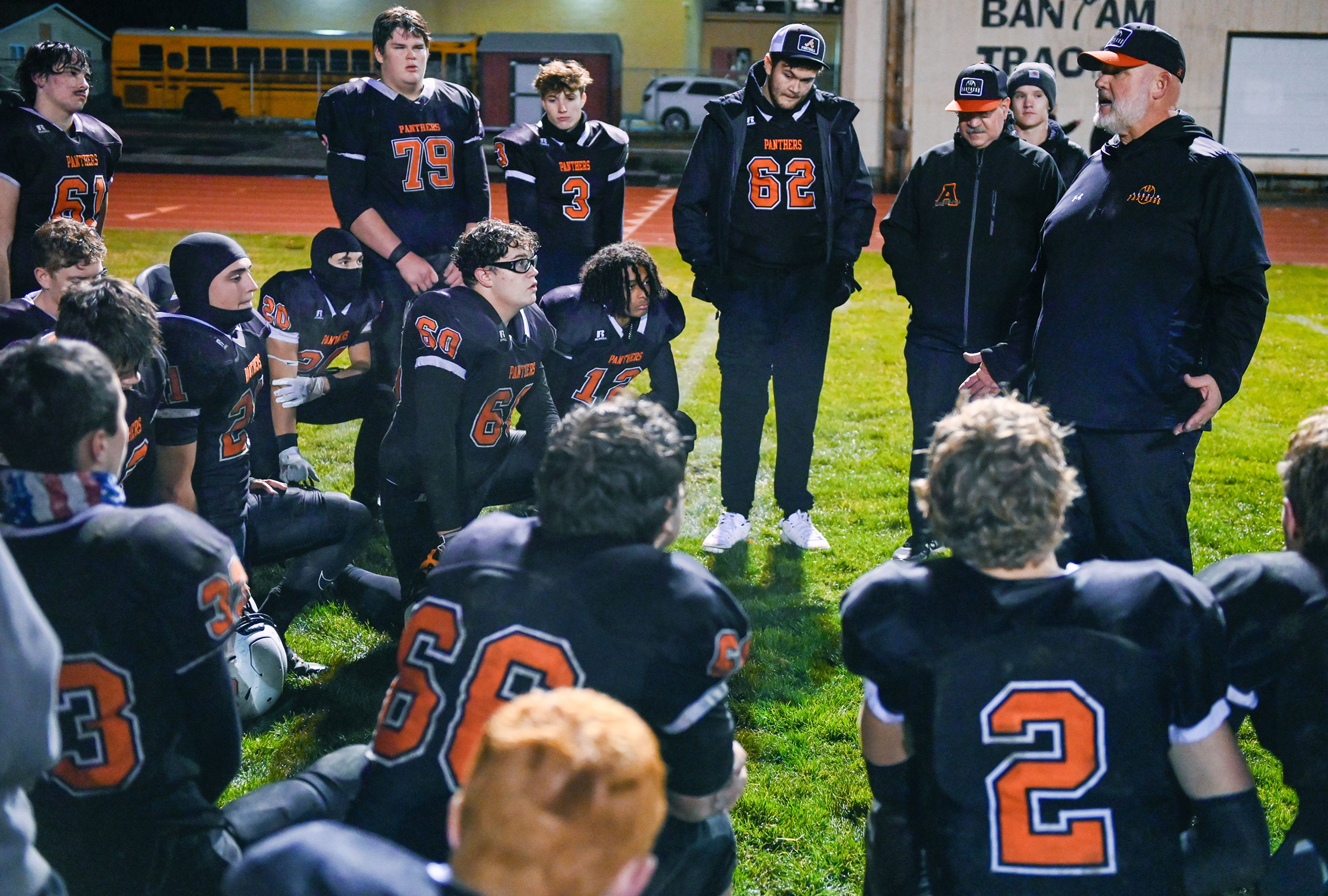 Asotin head coach Jim Holman, right, congratulates the team for their Washington 2B state tournament win over La Salle Saturday in Clarkston.