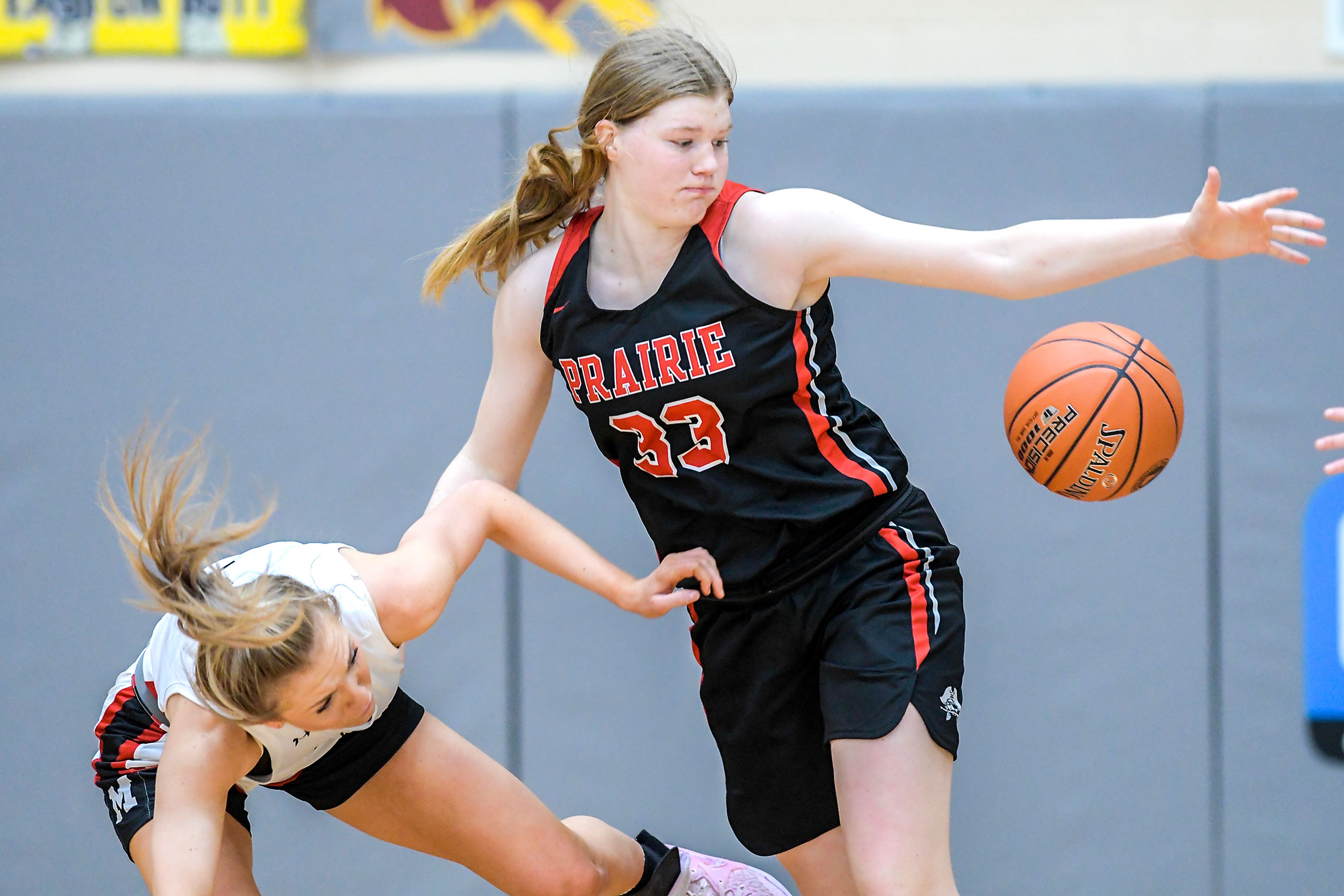 Prairie guard Sage Elven watches the ball bounce away from Murtaugh guard Ady Stanger during a quarterfinal game in the girls 1A DI state tournament Thursday at Columbia High School in Nampa.