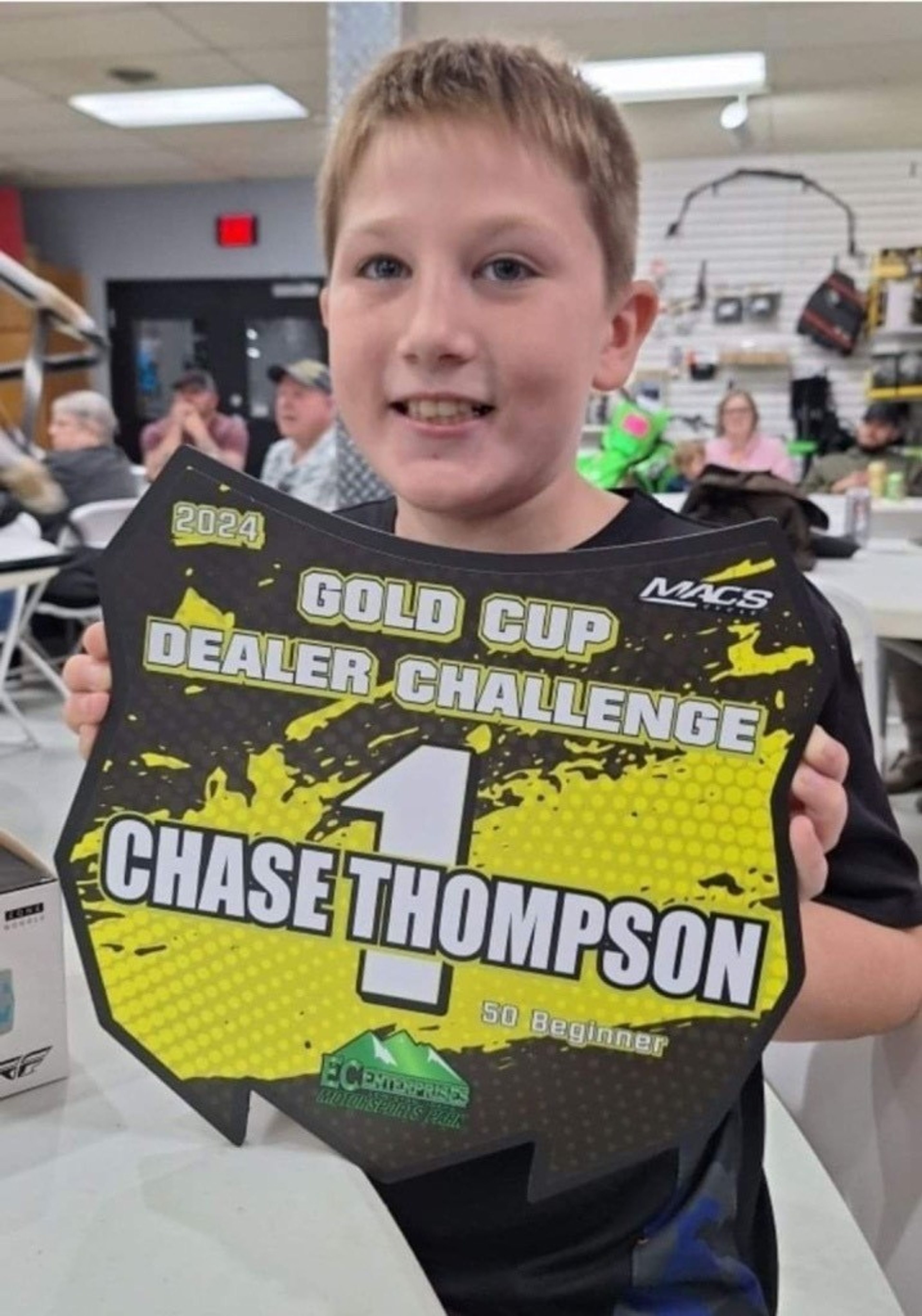 Chase Thompson, seen here with a trophy for motorcycle racing, recently saved his mother's life with quick action after she had a stroke at the family's home in Orofino.