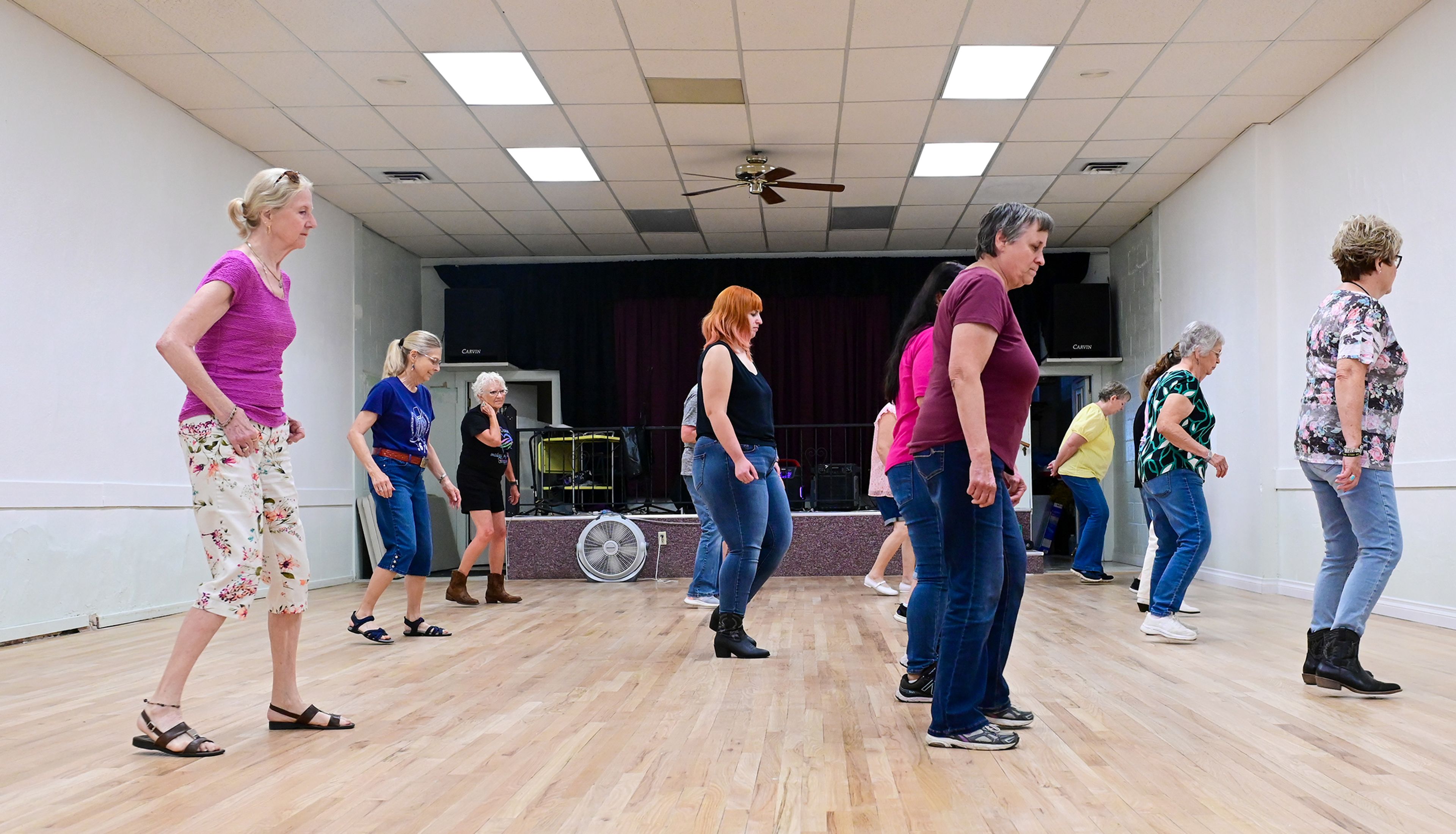 Line dancers fill the floor of the Sixth Street Senior Center, a weekly event at the center in Clarkston.