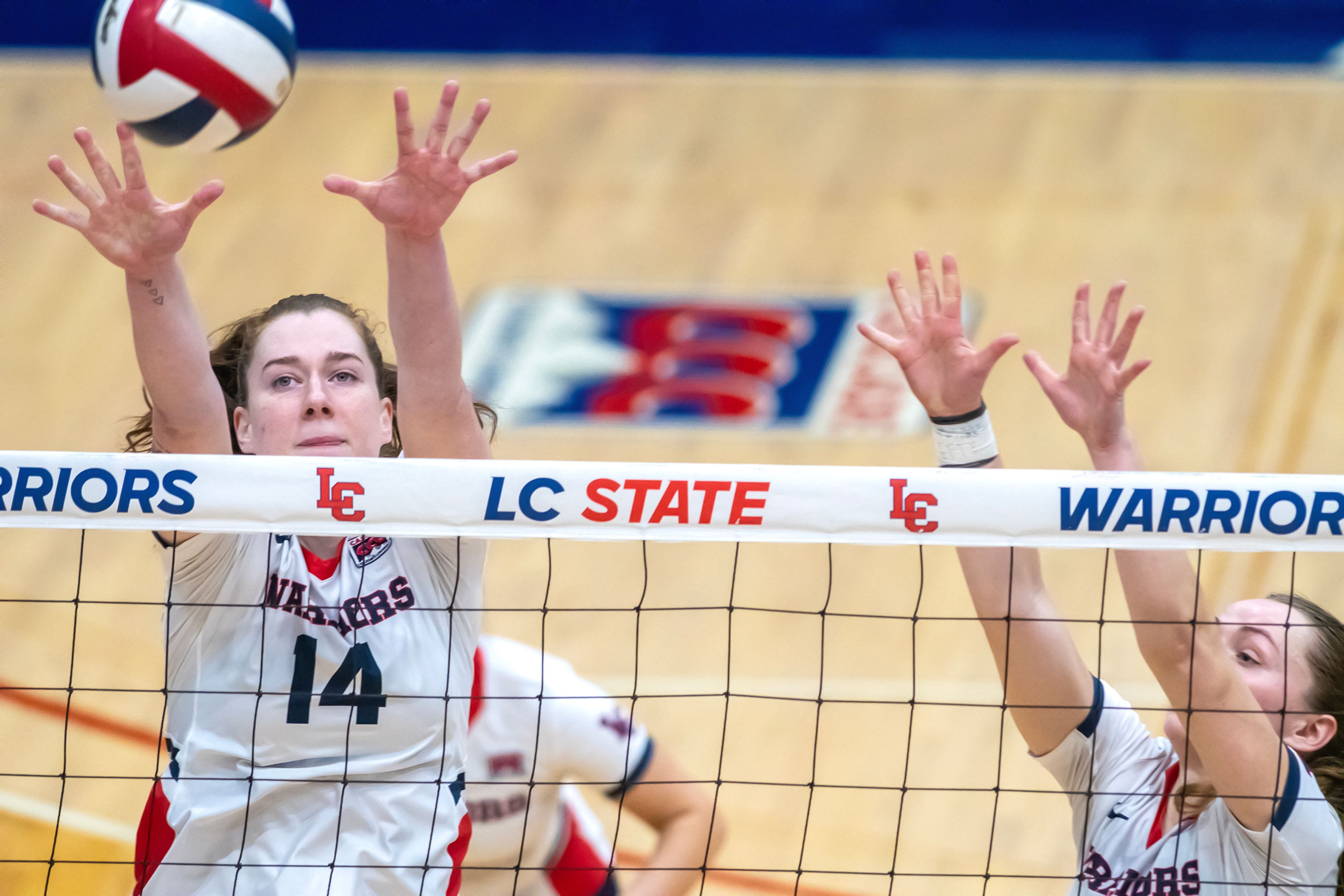 Lewis-Clark State opposite Anna Merrill looks to block a shot against Oregon Tech during a Cascade Conference Tournament play-in match Tuesday at the P1FCU Activity Center.