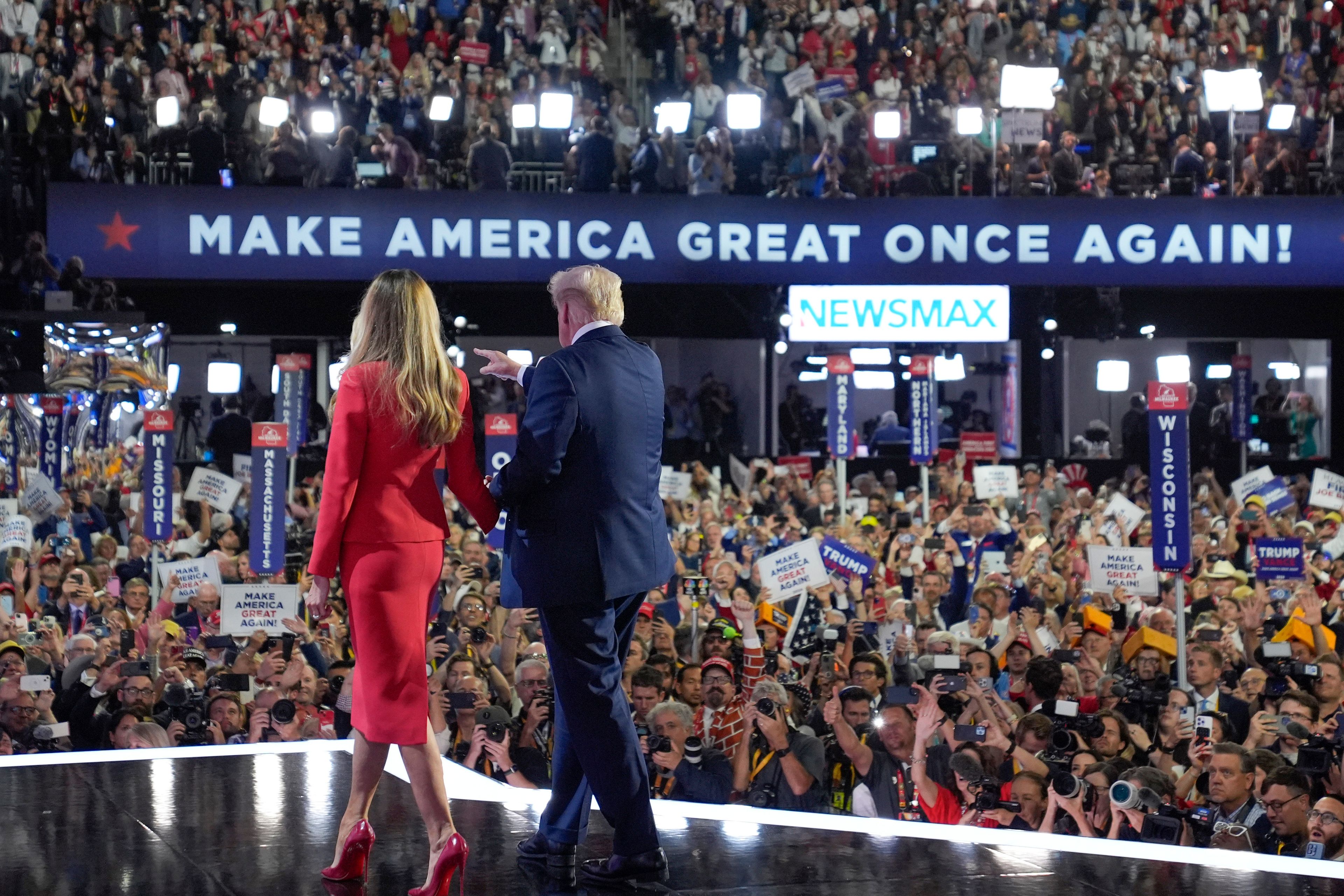 FILE - Republican presidential candidate former President Donald Trump stands on stage with former first lady Melania Trump during the final day of the Republican National Convention at the Fiserv Forum, July 18, 2024, in Milwaukee. (AP Photo/Evan Vucci)