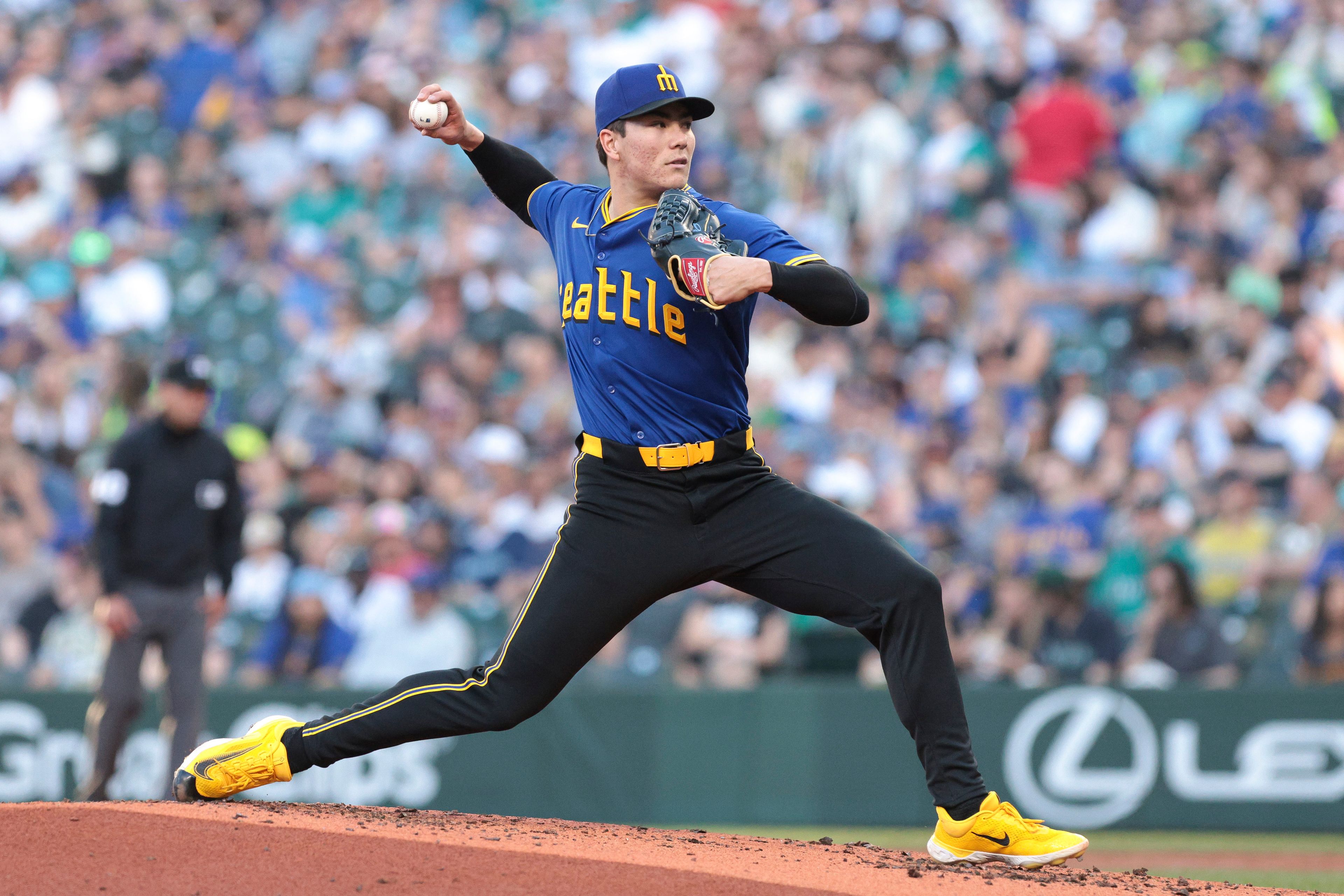 Mariners starting pitcher Bryan Woo throws during a game against the Athletics on Friday in Seattle.