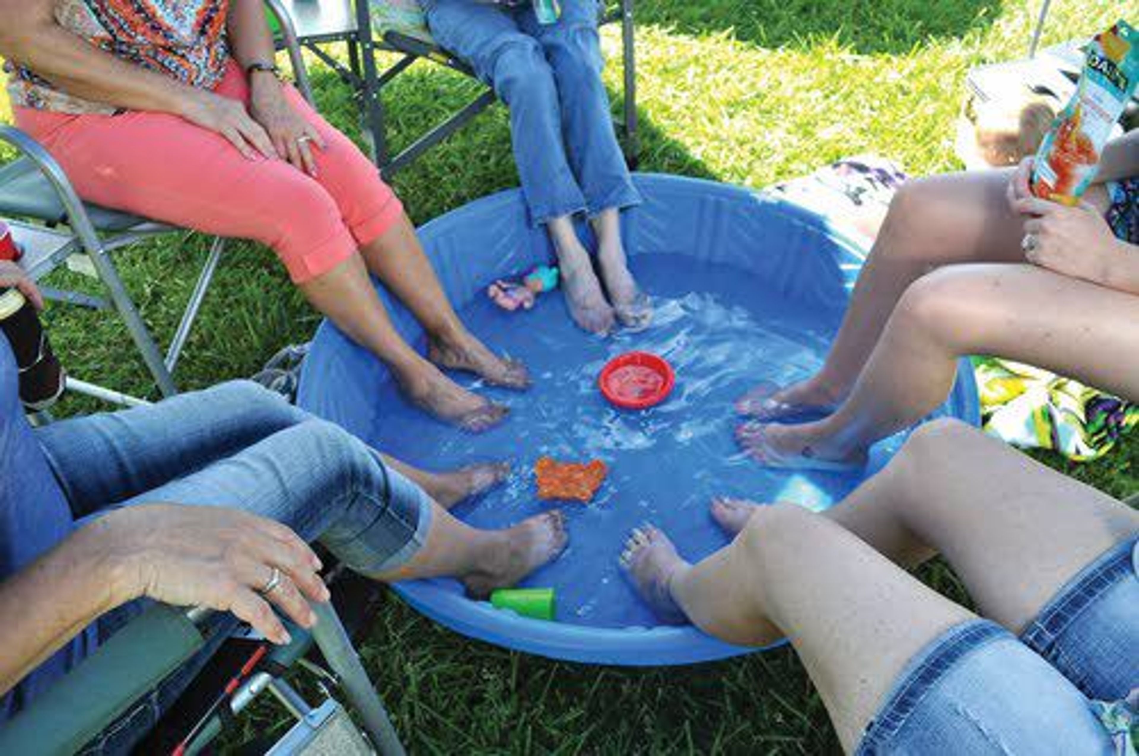 Glamping ladies take respite from the 90-degree weather at Sue Johnson's recent event in Lewiston.