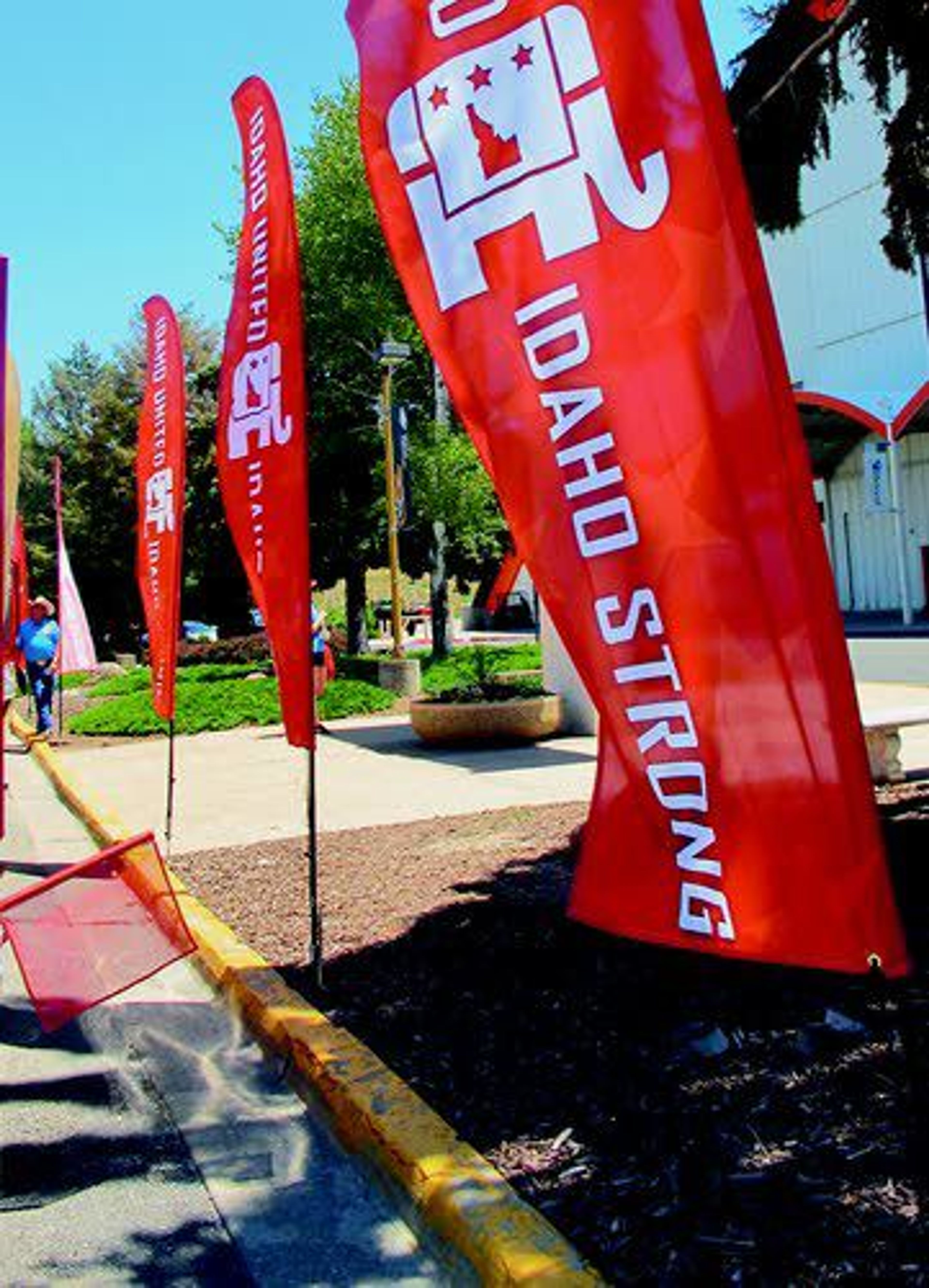 Signs with the Idaho GOP Convention’s motto “Idaho United, Idaho Strong” are displayed in outside the state GOP convention in Pocatello.