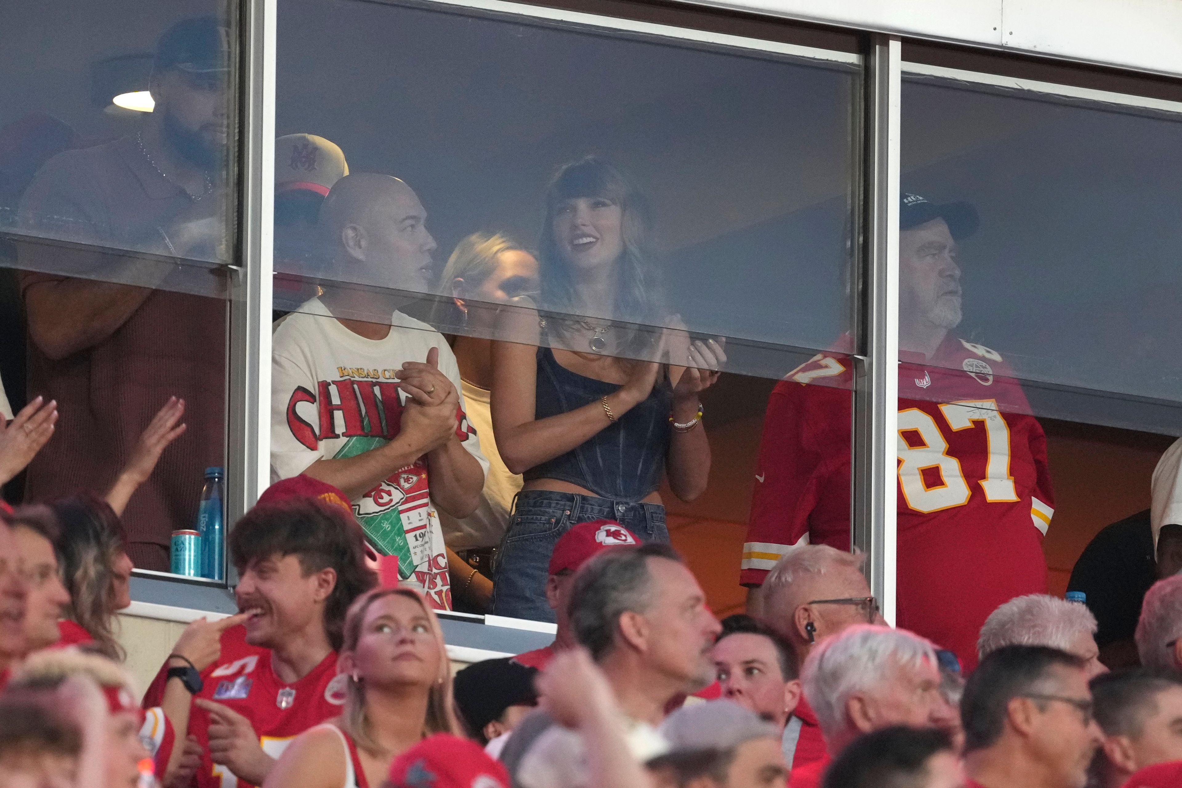 Taylor Swift is seen in a suite before the start of an NFL football game between the Kansas City Chiefs and the Baltimore Ravens Thursday, Sept. 5, 2024, in Kansas City, Mo.