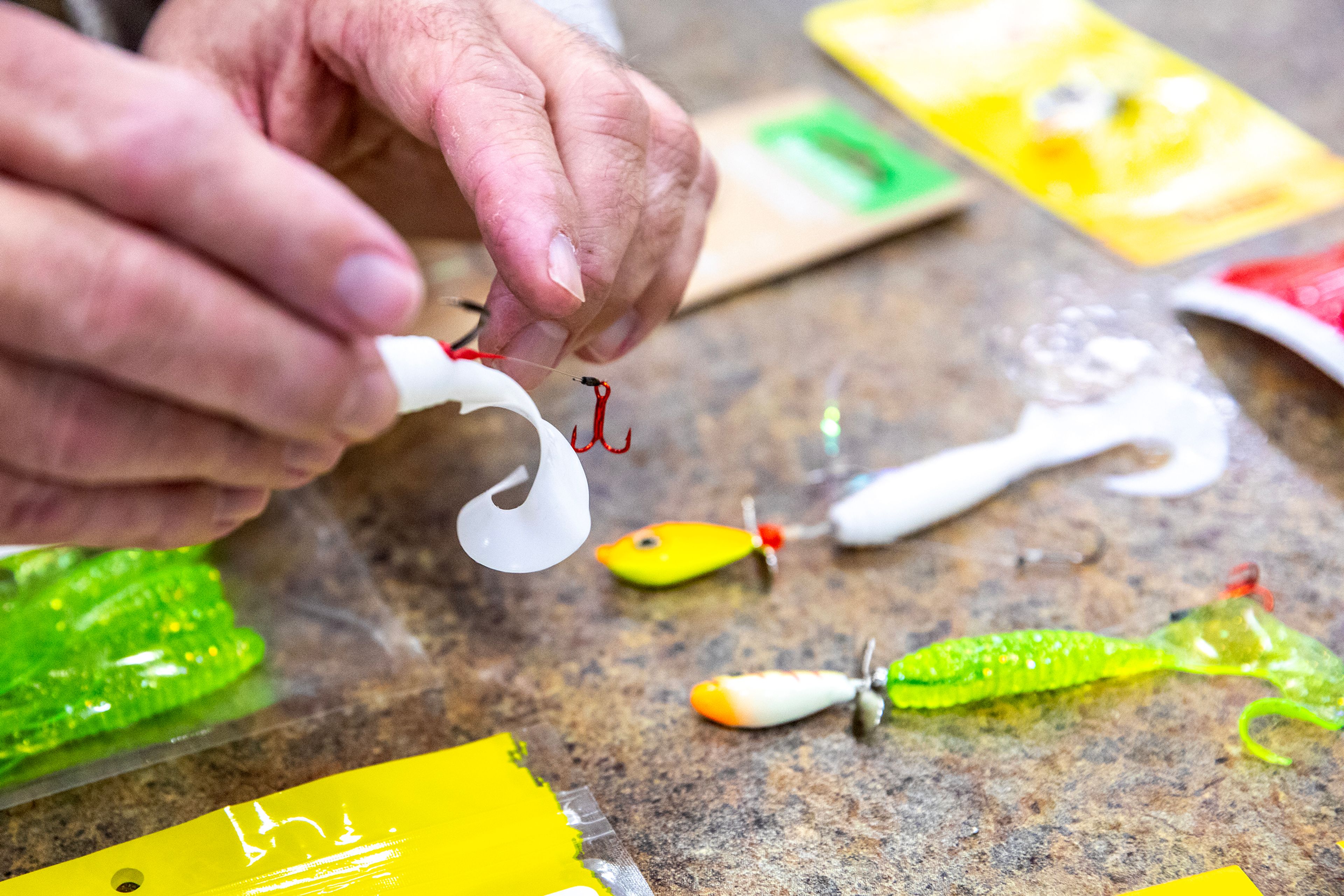 John Snaza talks about his recommendations lures to catch walleye Wednesday at North 40 Outfitters in Lewiston.