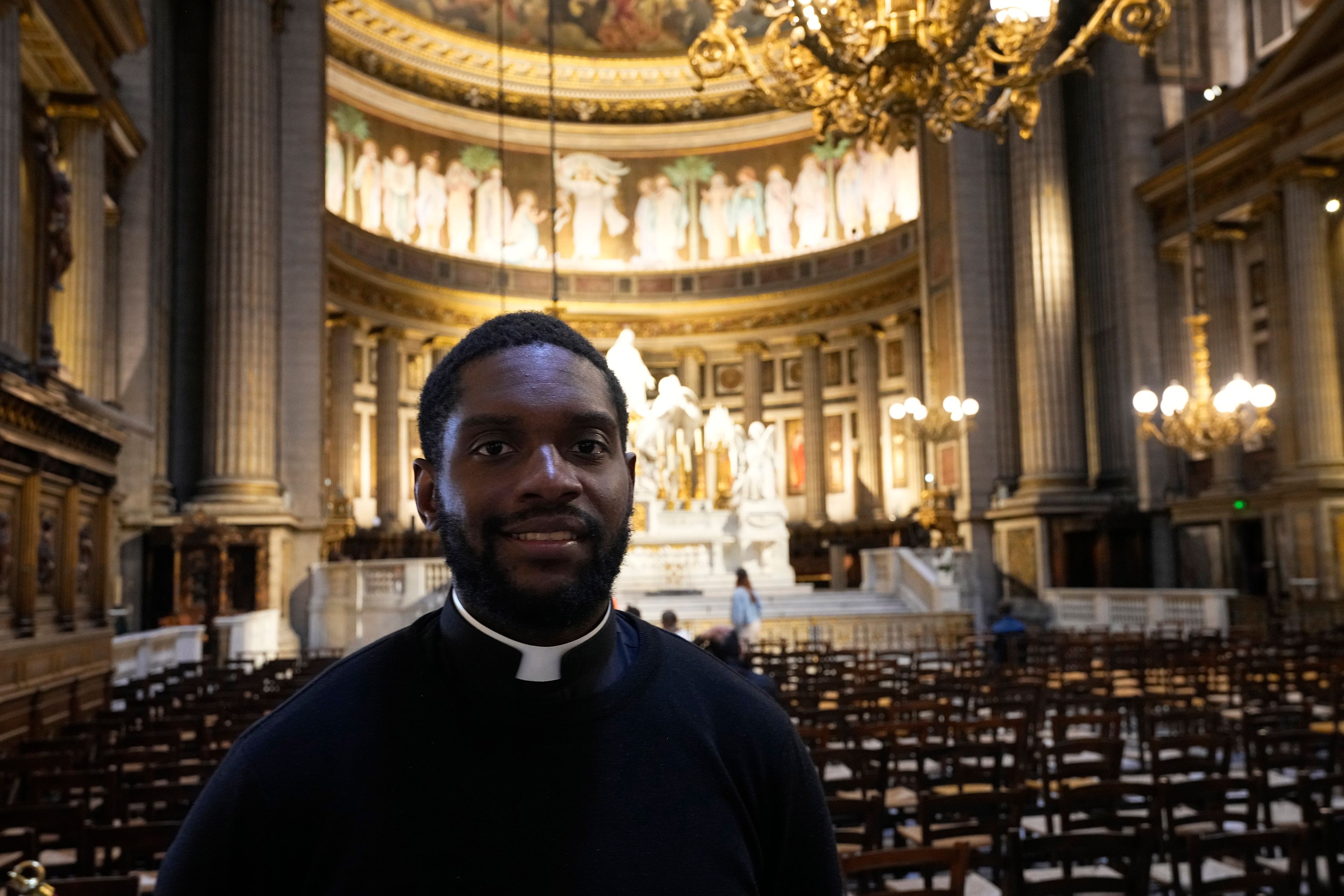 Jason Nioka, a former judo champion and deacon who's in charge of the largest contingent of Olympic chaplains, about 40 priests, nuns and lay Catholics, poses inside the Madeleine church, Thursday, May 30, 2024 in Paris. As athletes rev up their training and organizers finalize everything from ceremonies to podiums before the Paris Olympics, more than 120 faith leaders are preparing for a different challenge – spiritually supporting some 14,000 participants from around the world, especially those whose medal dreams will inevitably get crushed.