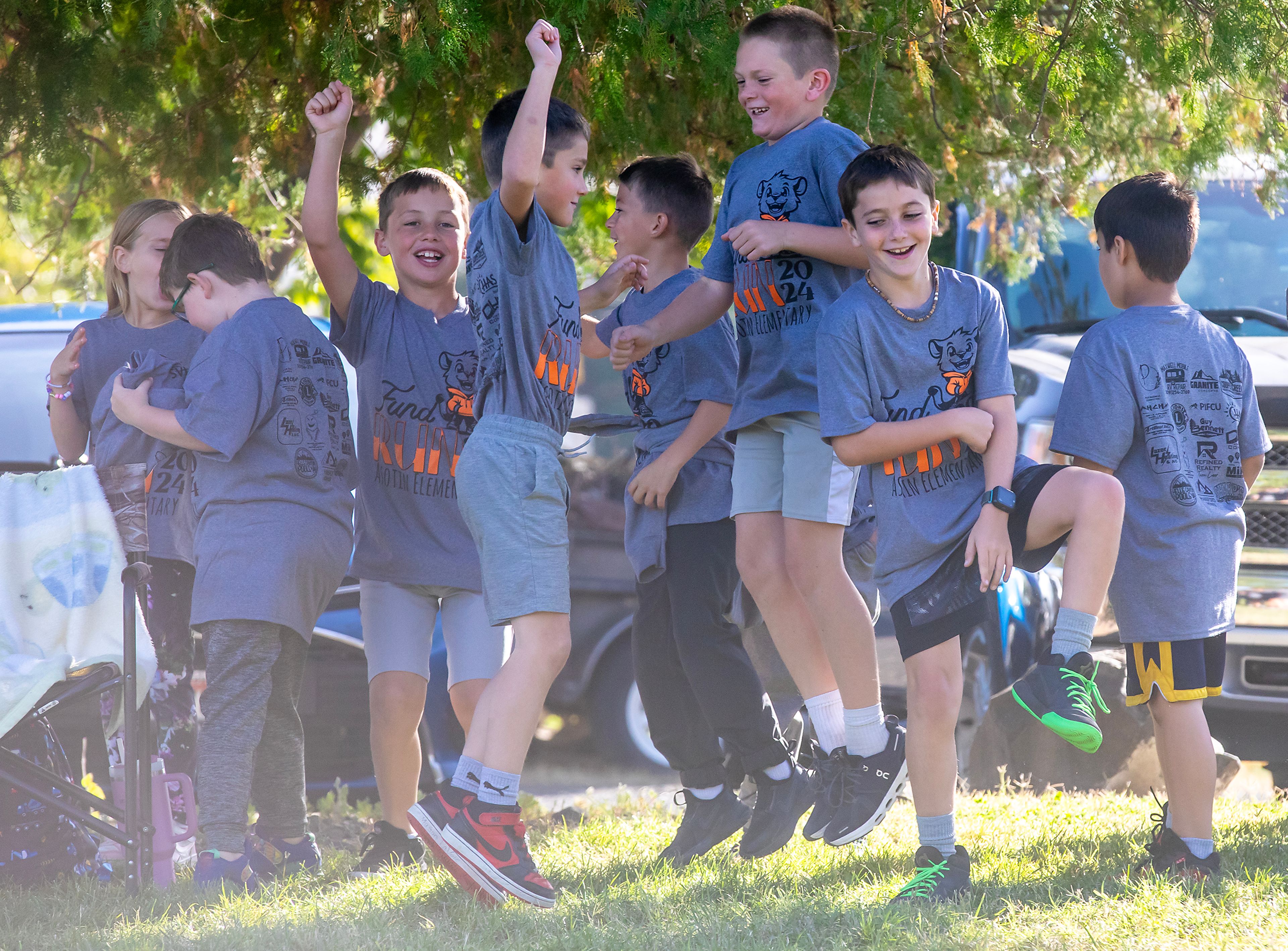 Kids dance to the music Thursday before the start of the annual Asotin Fund Run at Chief Looking Glass Park.