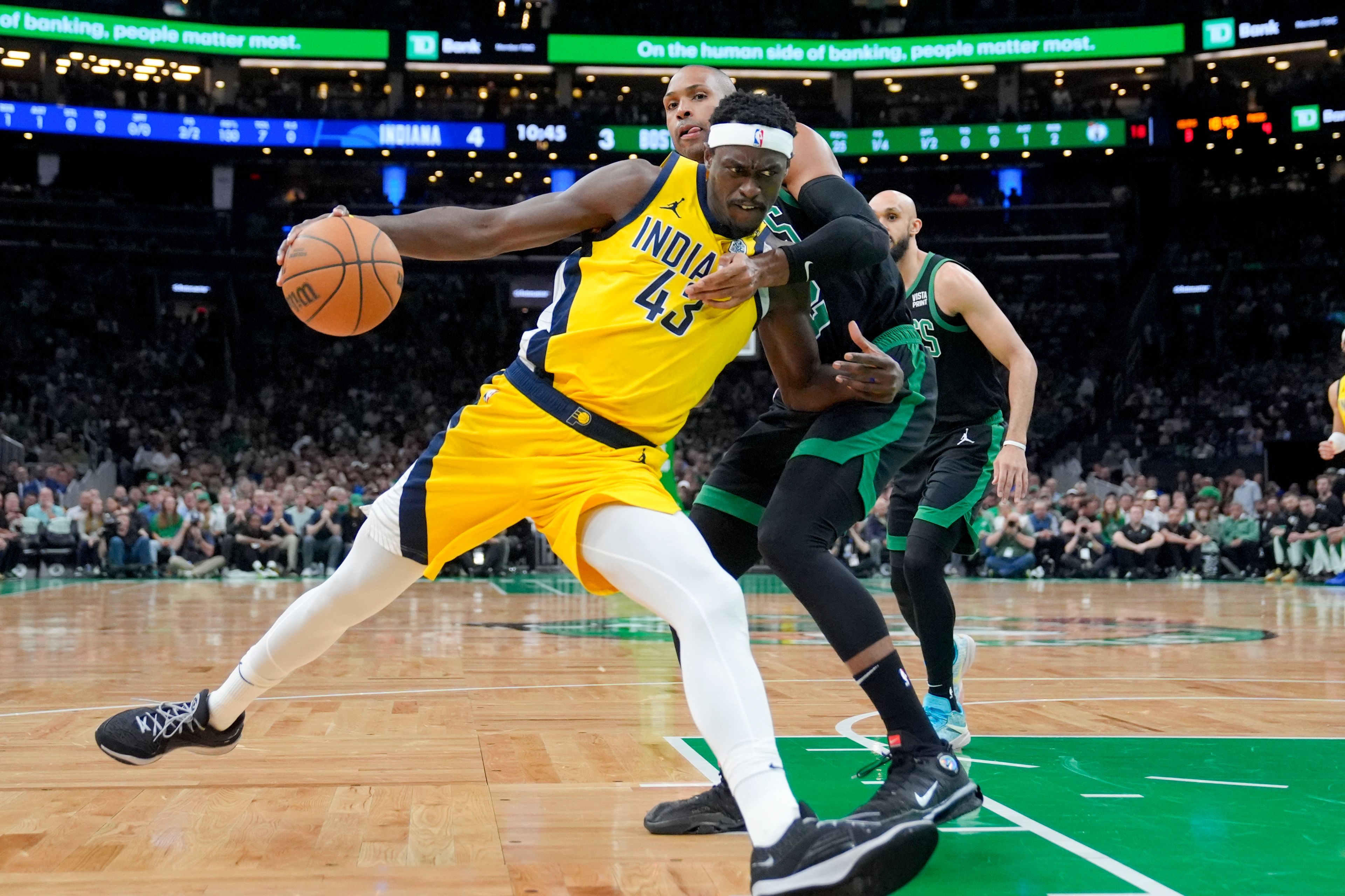 Pacers forward Pascal Siakam, left, is defended by Celtics center Al Horford during the first half of Game 2 of the Eastern Conference finals Thursday in Boston.