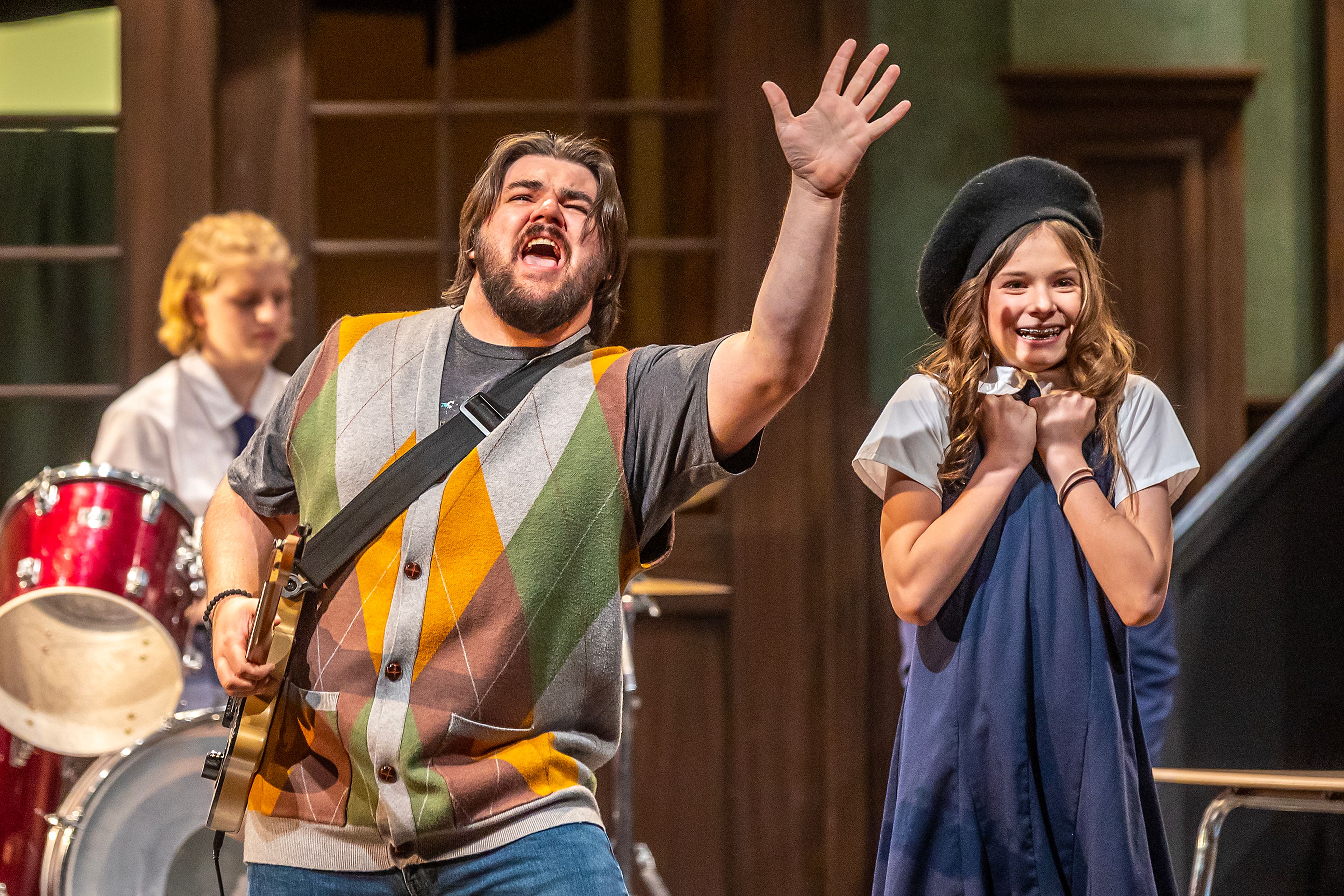 Grant Benjamin, left, plays Dewey Finn, as Tinley Taylor plays Summer in the legends cast during a rehearsal for the Civic Theatre production of School of Rock Tuesday, May 21, in Lewiston.