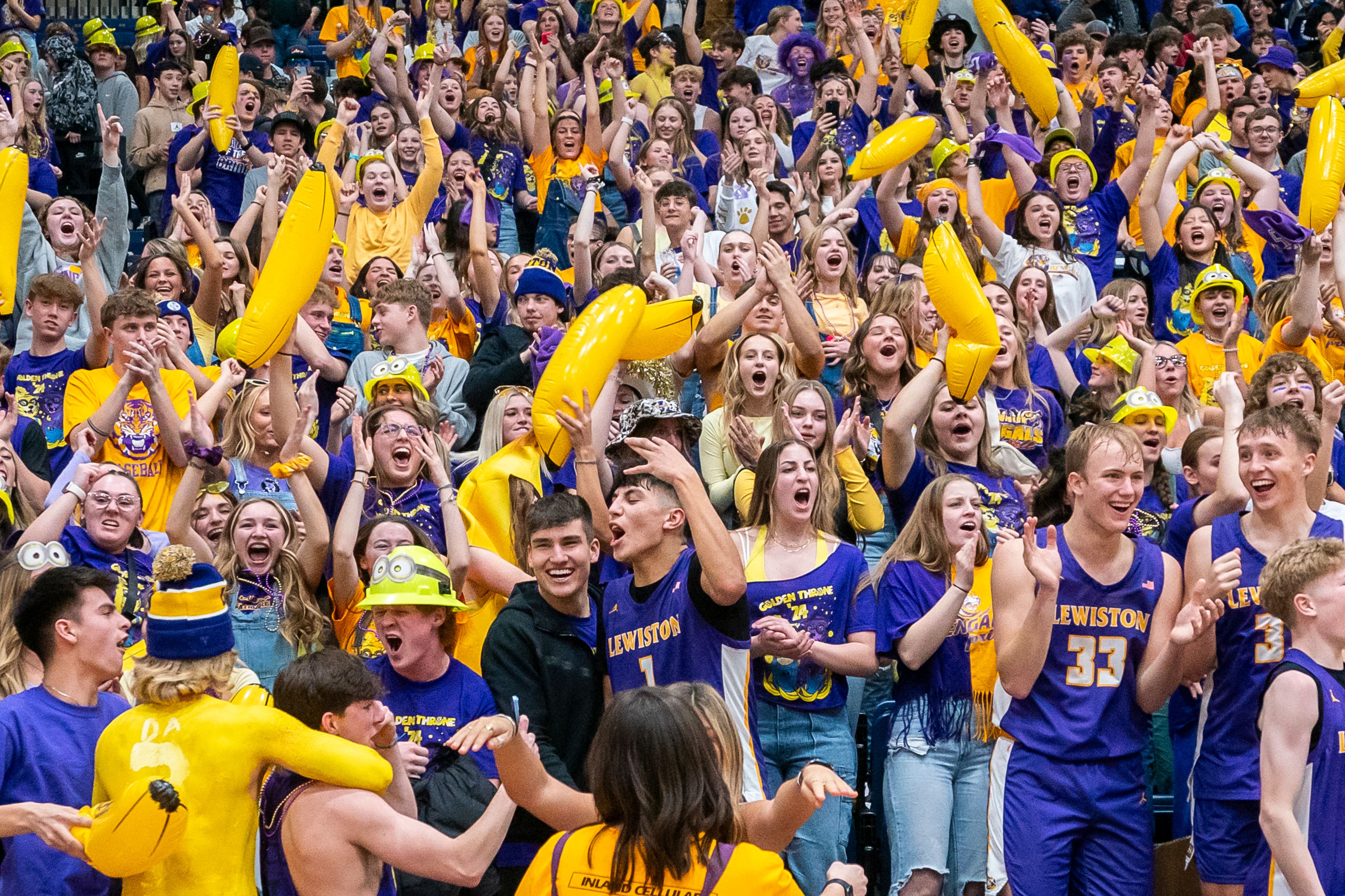 The Lewiston High School student section celebrates after winning the Golden Throne on Friday inside the P1FCU Activity Center in Lewiston.