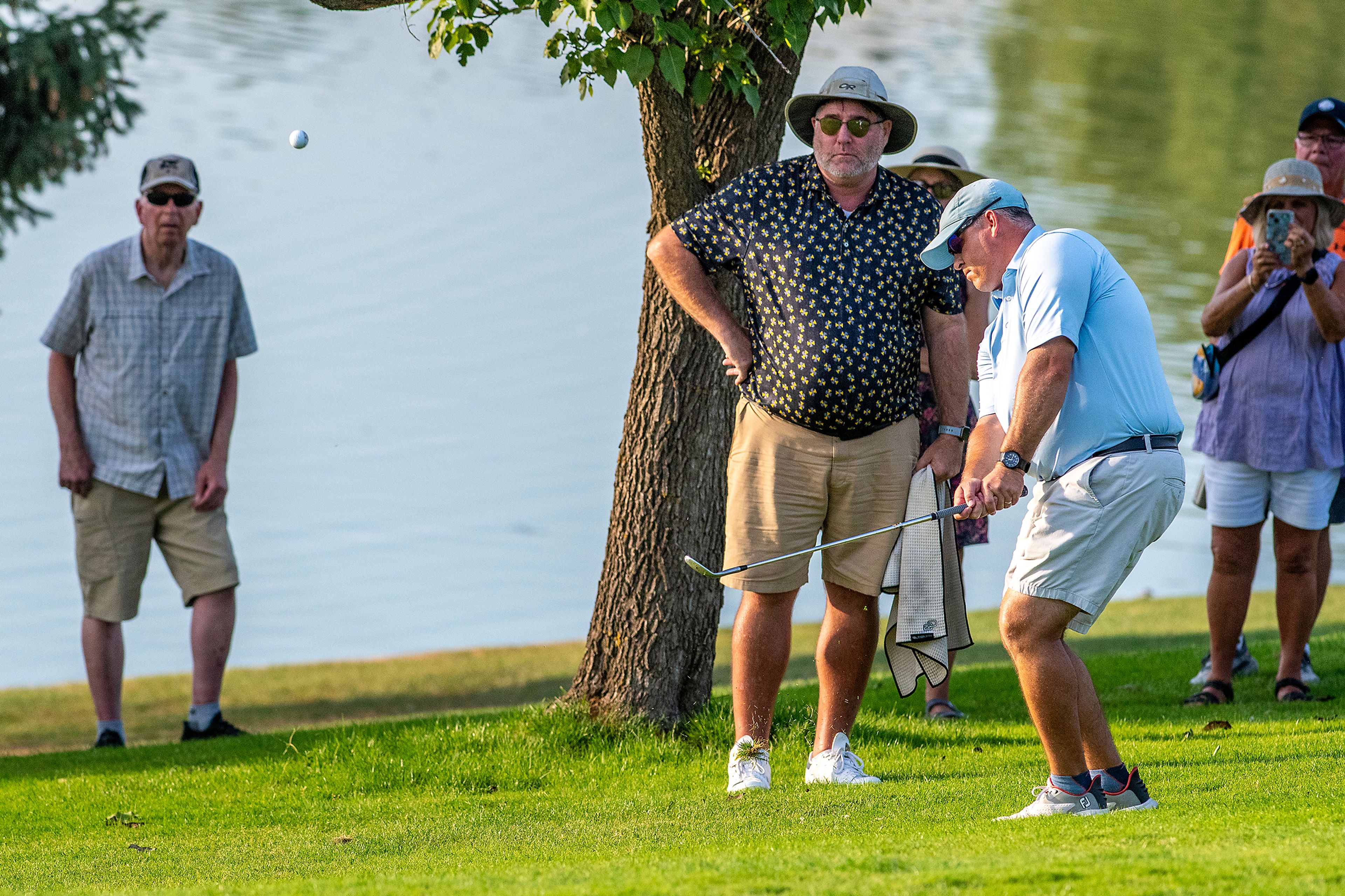 Jason Huff hits his ball towards the green on the final hole at the Sole Survivor Tournament Monday at the Lewiston Golf and Country Club.