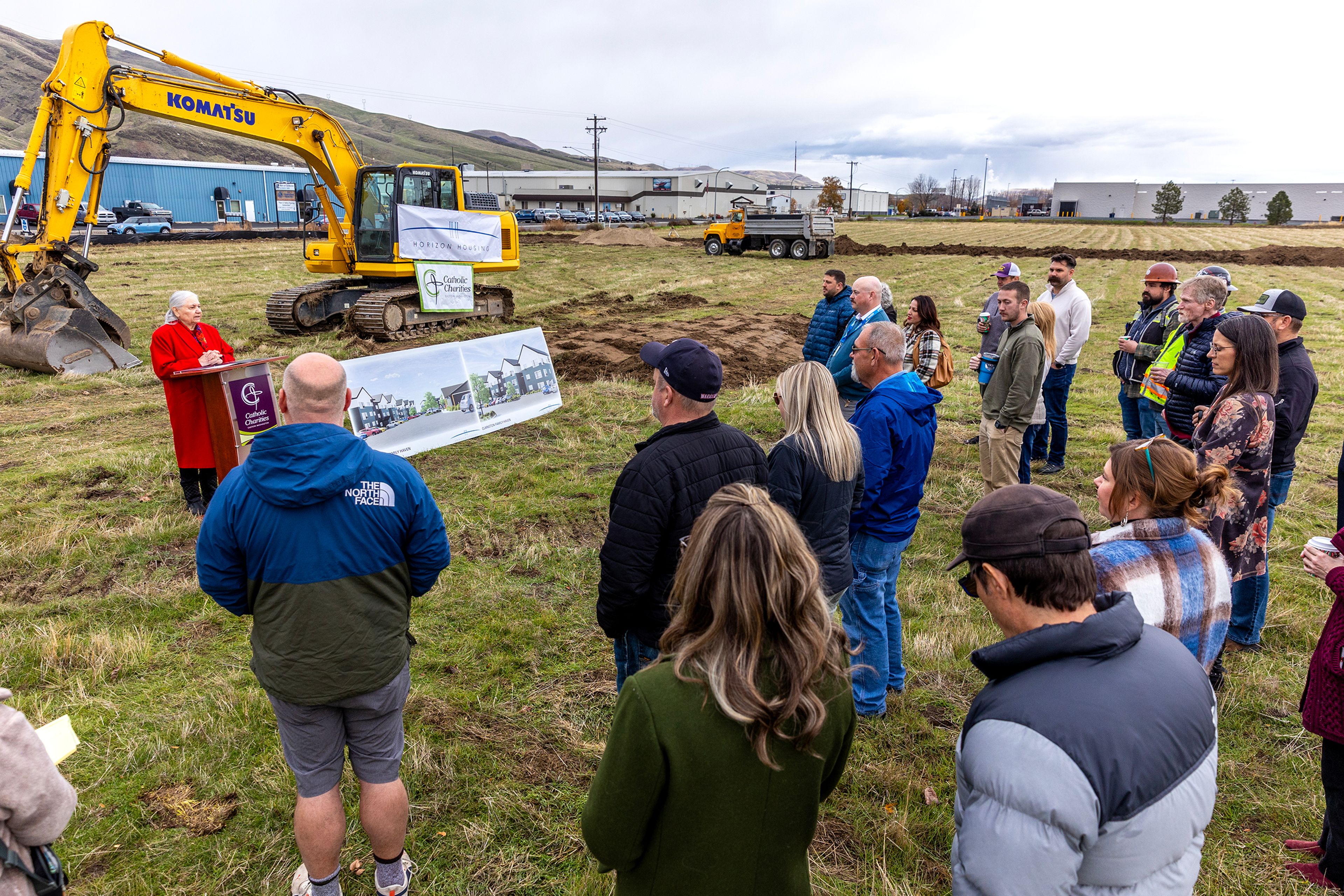 Clarkston Mayor Monika Lawrence speaks at the groundbreaking for the new apartments that will be built in the empty field off of Port Drive next to Walmart on Monday in Clarkston.