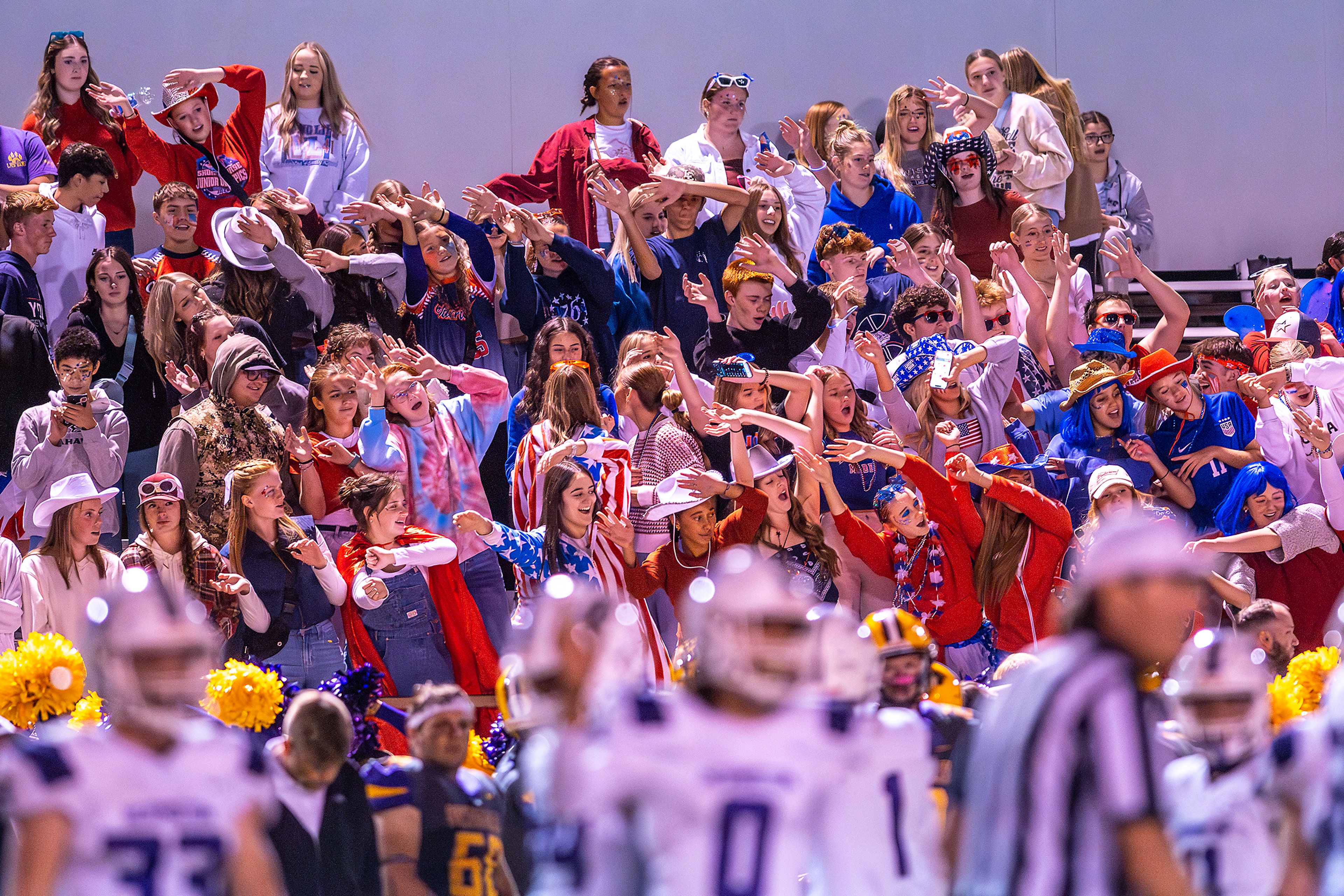 Lewiston students cheer on their team against Hermiston during a nonconference game at Bengal Field Friday in Lewiston.,