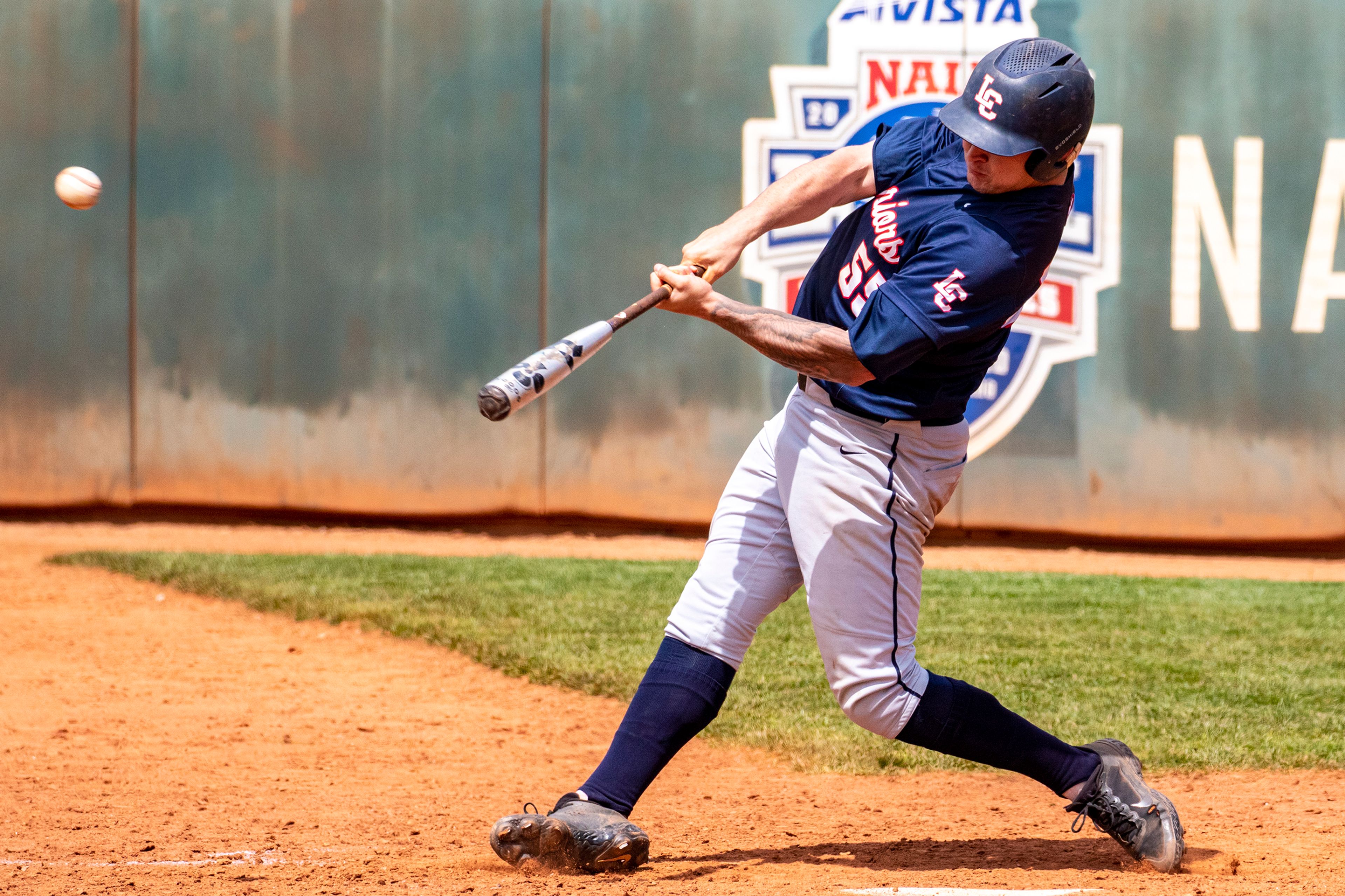 Lewis-Clark State first baseman Charlie Updegrave hits a three-run home run during a May 10 Cascade Conference tournament game against British Columbia at Harris Field. Updegrave had several captivating moments in the 2022 season.