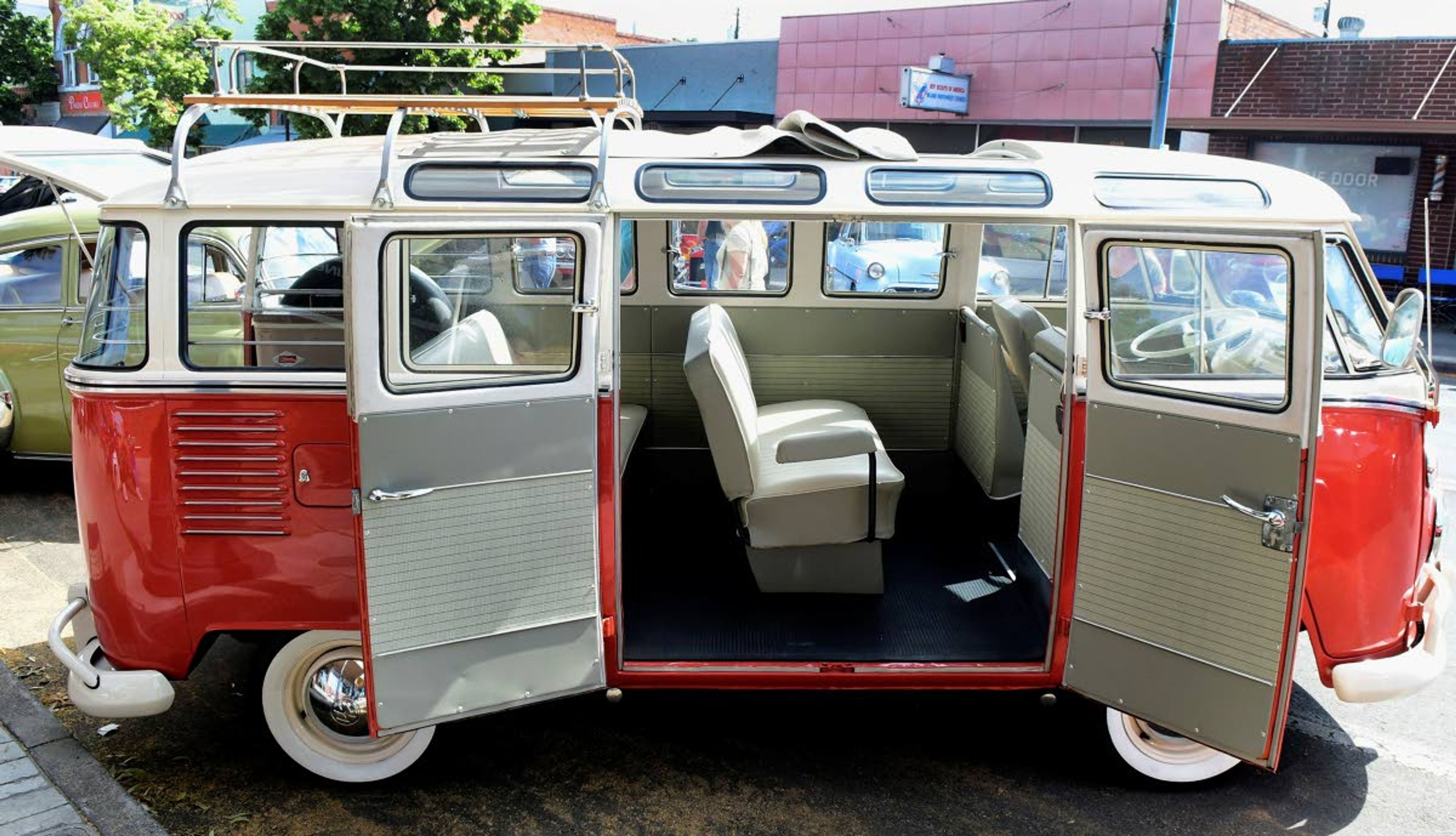 Teresa Bonner of Asotin revels in driving her bright 1963 Volkswagen 23-window Micro Bus.