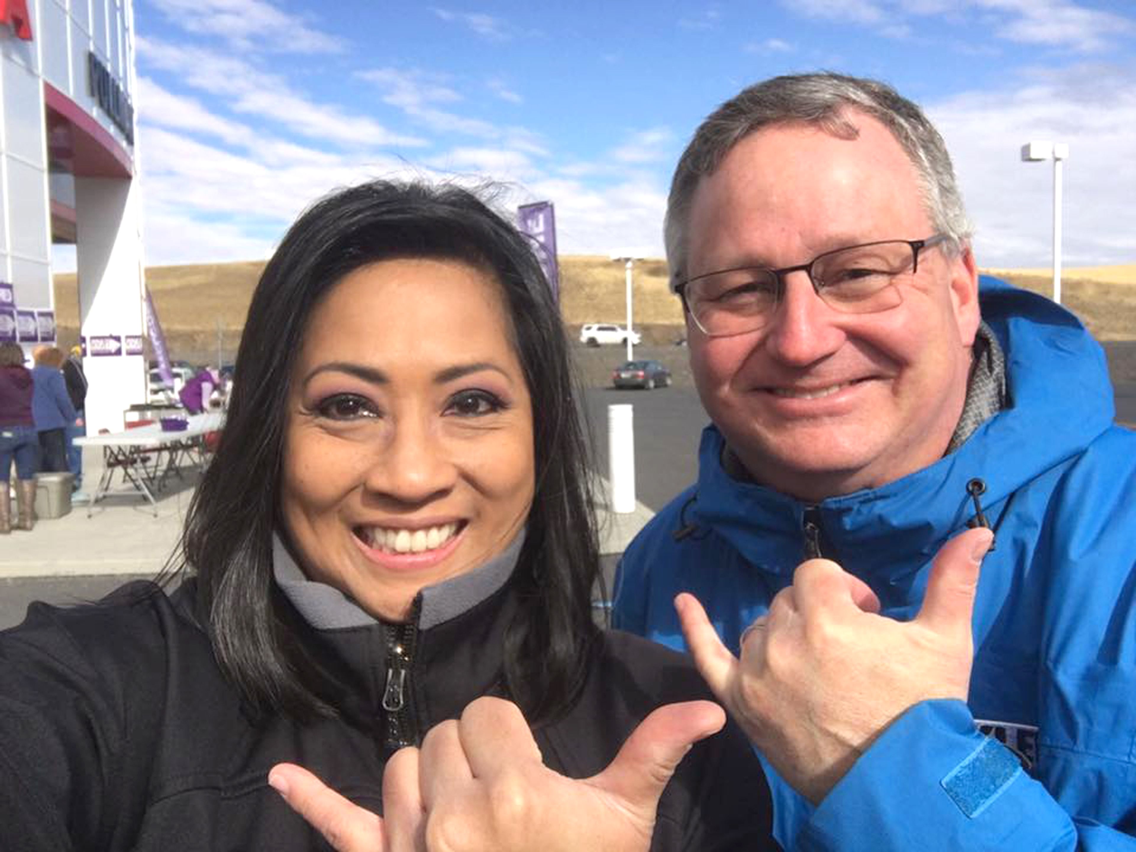 Keith Havens, right, KLEW weather forecaster, and Anna Velasquez, a former KLEW anchor and news director, pose for a picture about three years ago at a Pullman auto dealership where they had emceed a community Alzheimer's walk. Havens is leaving KLEW Friday. Velasquez's last day at the station was May 31.