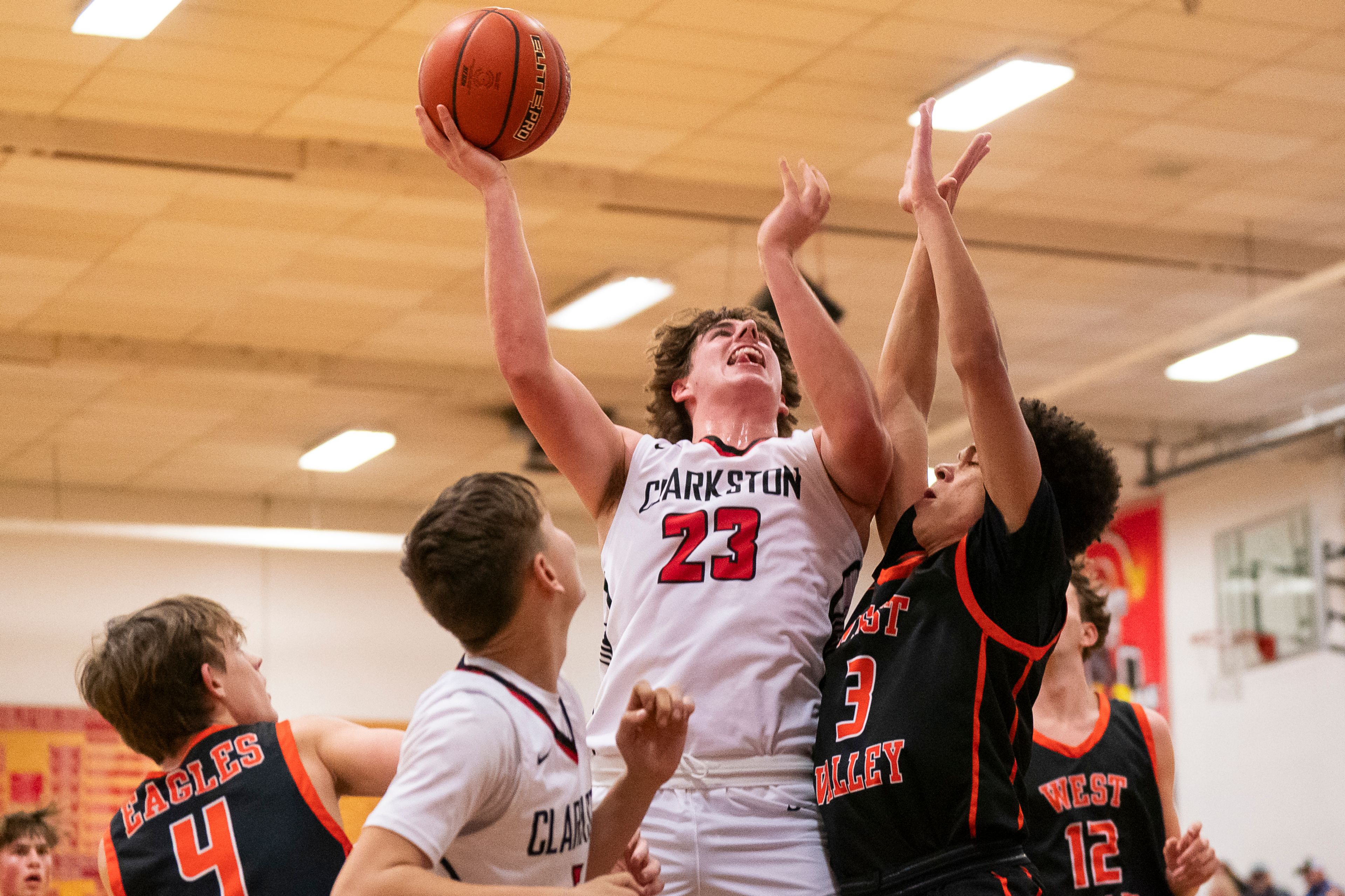 Clarkston’s Josh Hoffman (23) goes up for a shot during their game against West Valley on Tuesday at Clarkston High School.