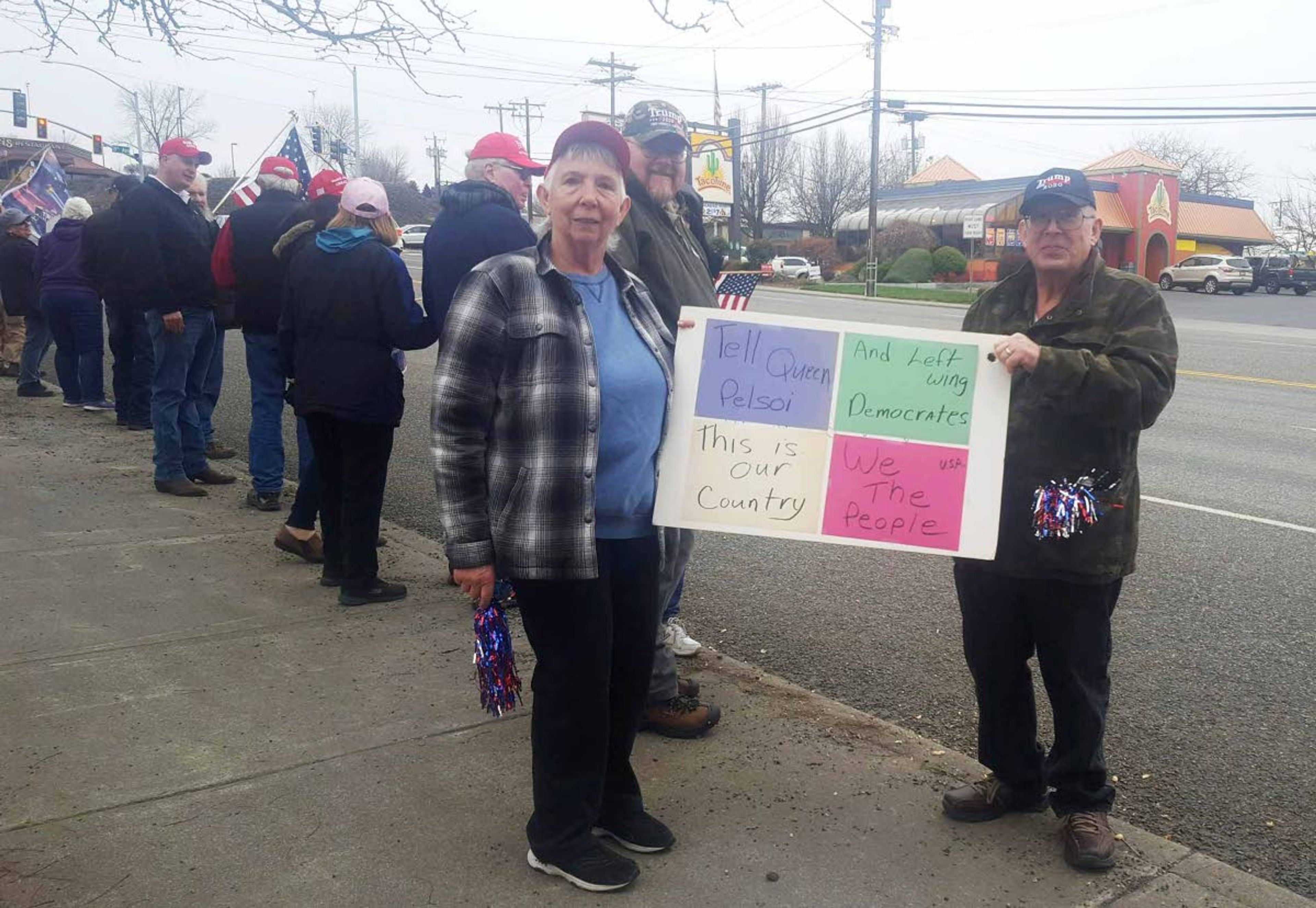 Linda and Doug Farrington of Lewiston stand with a sign they made for a Republican event supporting President Donald Trump. The Farringtons were among more than 150 people who participated in the Saturday gathering in Lewiston.