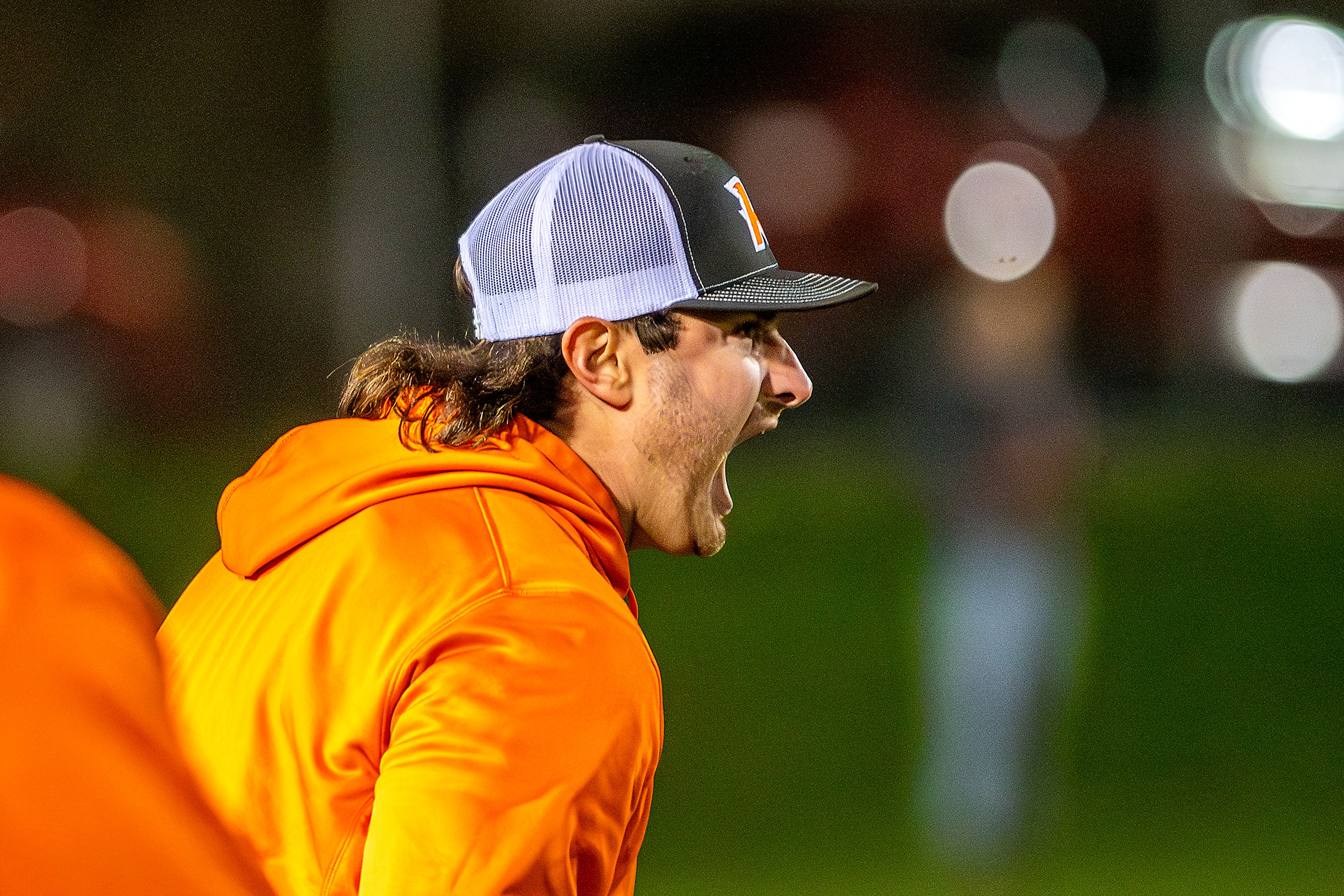 Kendrick head coach Zane Hobart reacts with a yell with the Tigers leading against Logos in a semifinal game of the Idaho State Football Class 2A Championships Friday at Bengal Field in Lewiston.