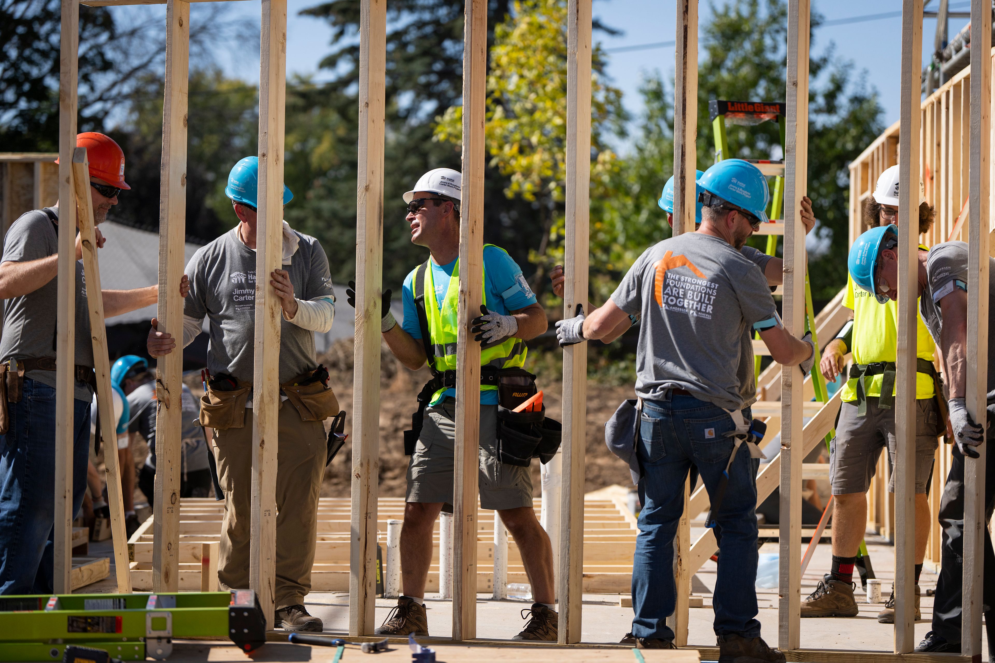 Volunteers build houses during Twin Cities Habitat for Humanity's 2024 Jimmy & Rosalynn Carter Work Project at the site of the former Hillcrest Golf Course in St. Paul, Minn. on Monday, Sept. 30, 2024. (Leila Navidi /Star Tribune via AP)