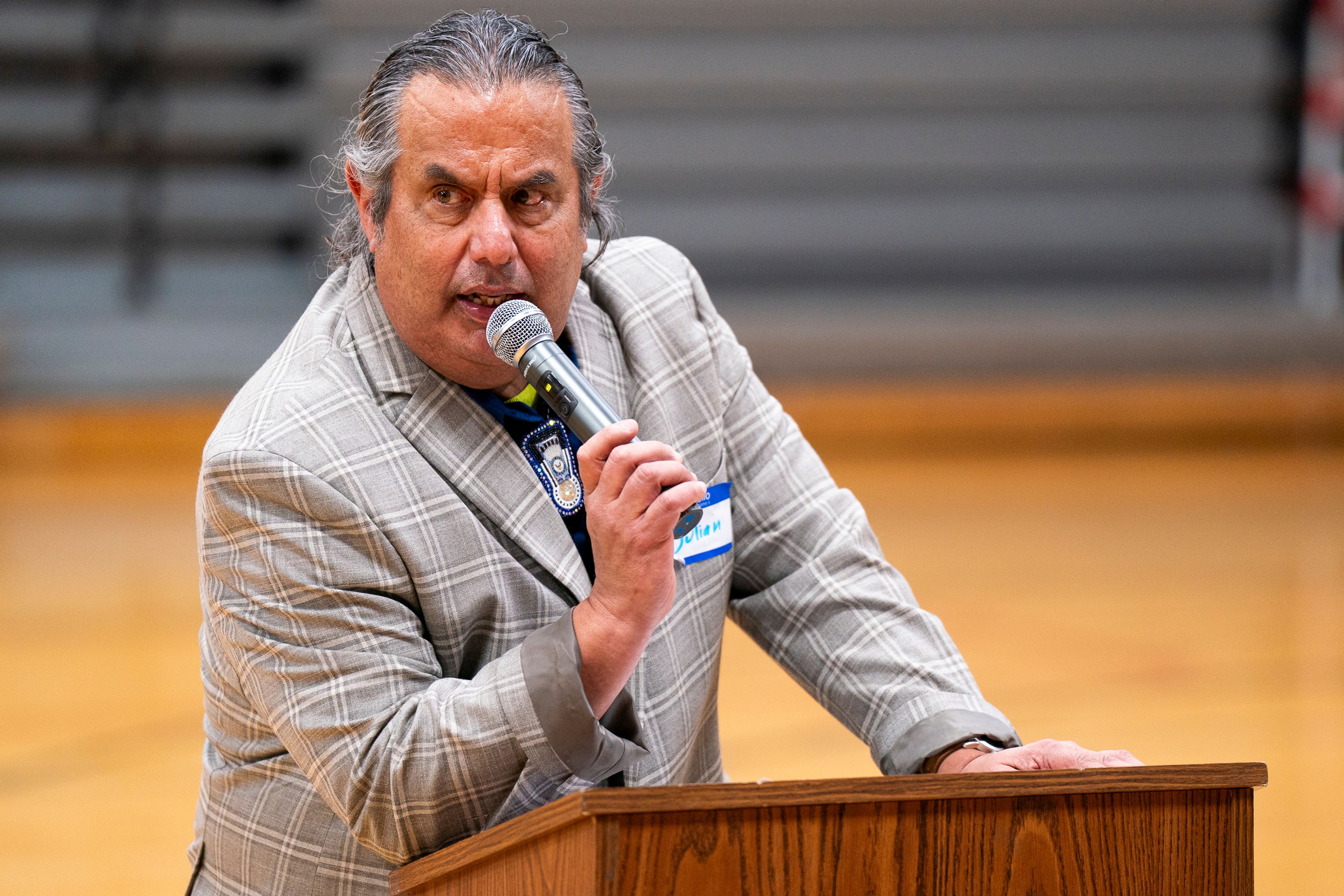 Nimiipuu Protecting the Environment coordinator Julian Matthews speaks to the crowd during the Honor the Wolf Ceremony inside Pi-Nee-Waus Community Center in Lapwai on Saturday