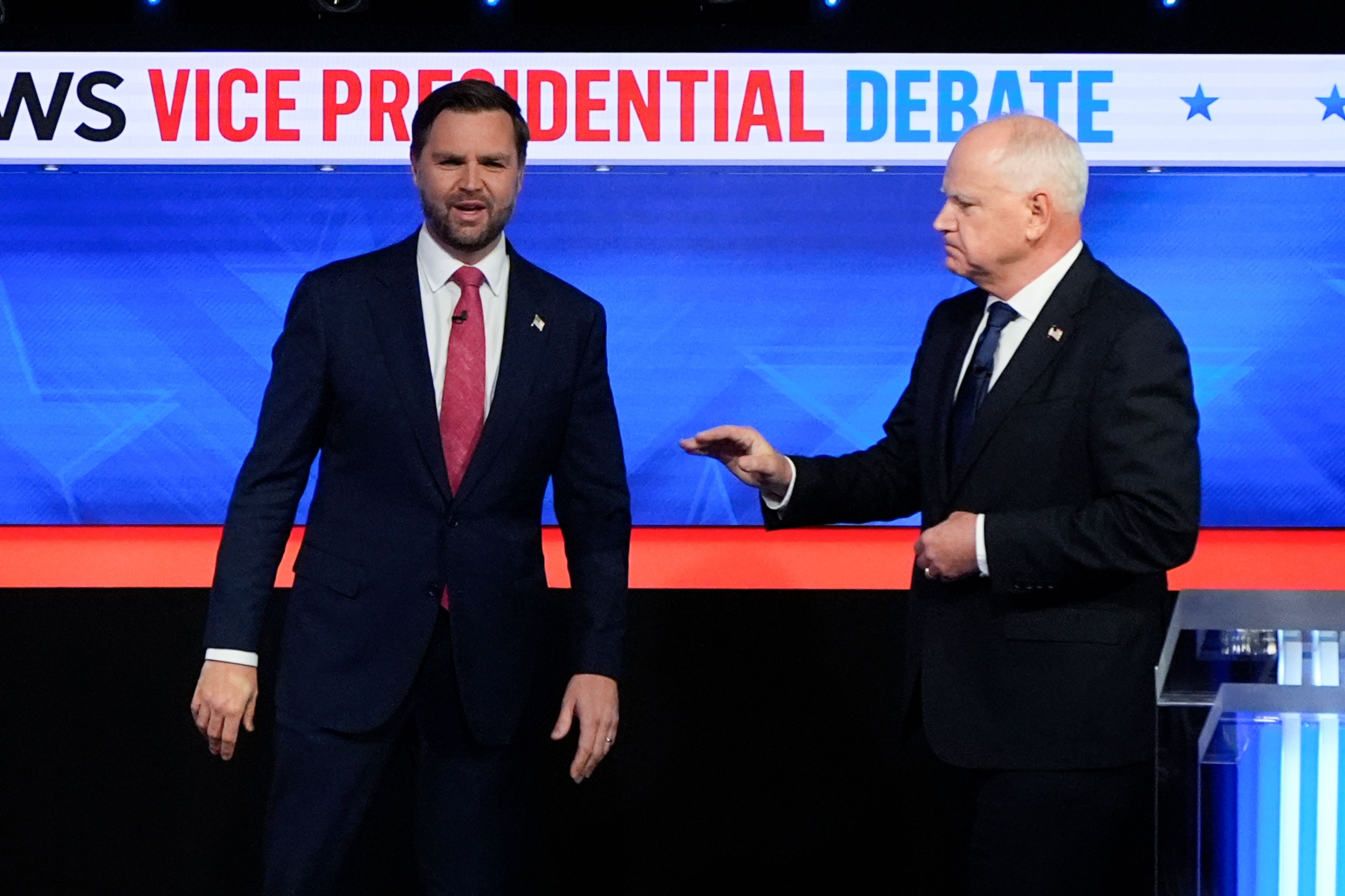 Republican vice presidential nominee Sen. JD Vance, R-Ohio, left, and Democratic vice presidential nominee Minnesota Gov. Tim Walz, arrive for a CBS News vice presidential debate, Tuesday, Oct. 1, 2024, in New York. (AP Photo/Julia Demaree Nikhinson)