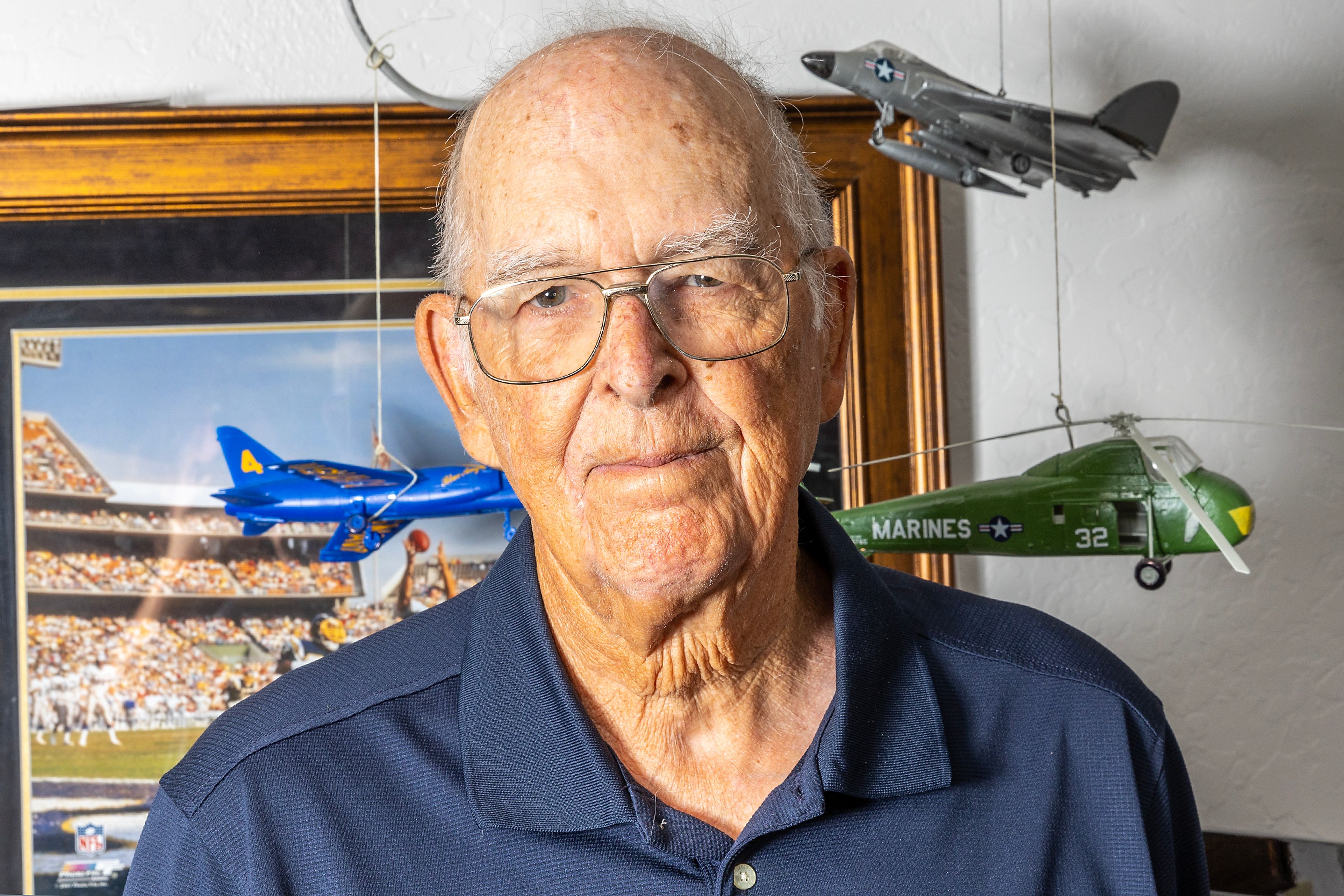 Ken McLaughlin is pictured with several model aircrafts Thursday, July 13, at his home in Clarkston.