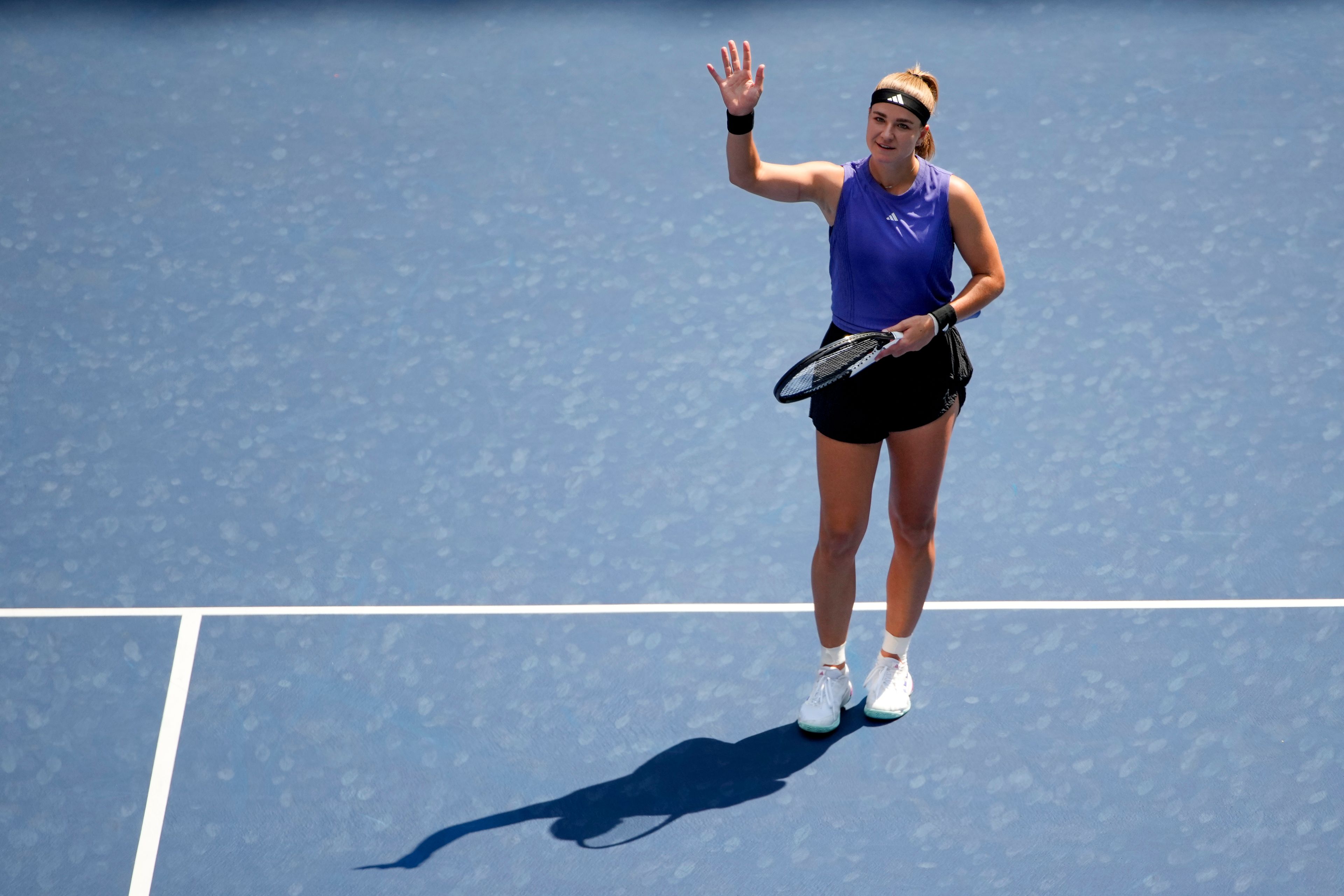 Karolina Muchova, of the Czech Republic, waves to the crowd after defeating Beatriz Haddad Maia, of Brazil, during the quarterfinals of the U.S. Open tennis championships, Wednesday, Sept. 4, 2024, in New York.