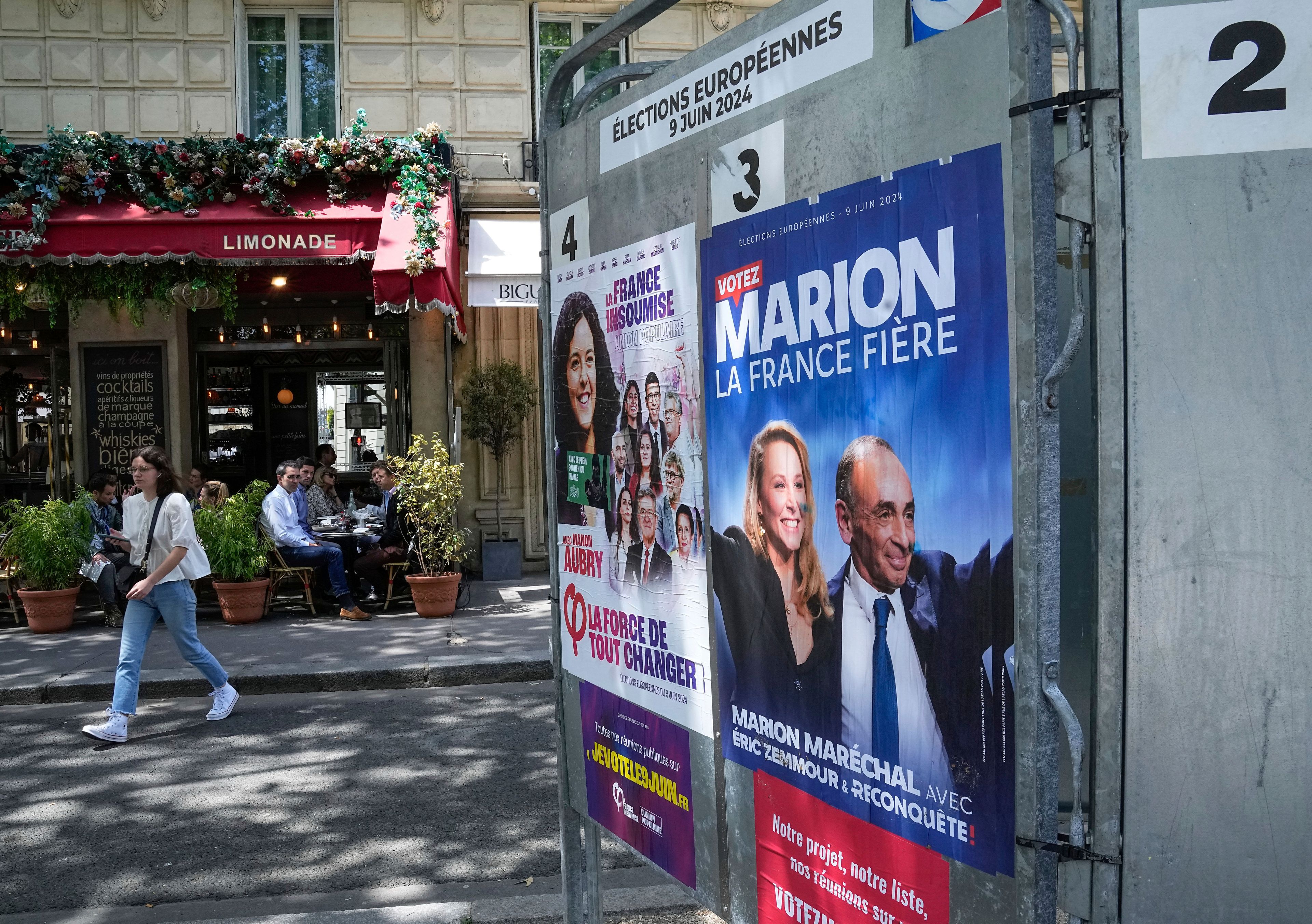 Campaign posters are displayed next to a restaurant for the upcoming European election in Paris, Thursday, June 6, 2024. The European Election will take place on June 9.