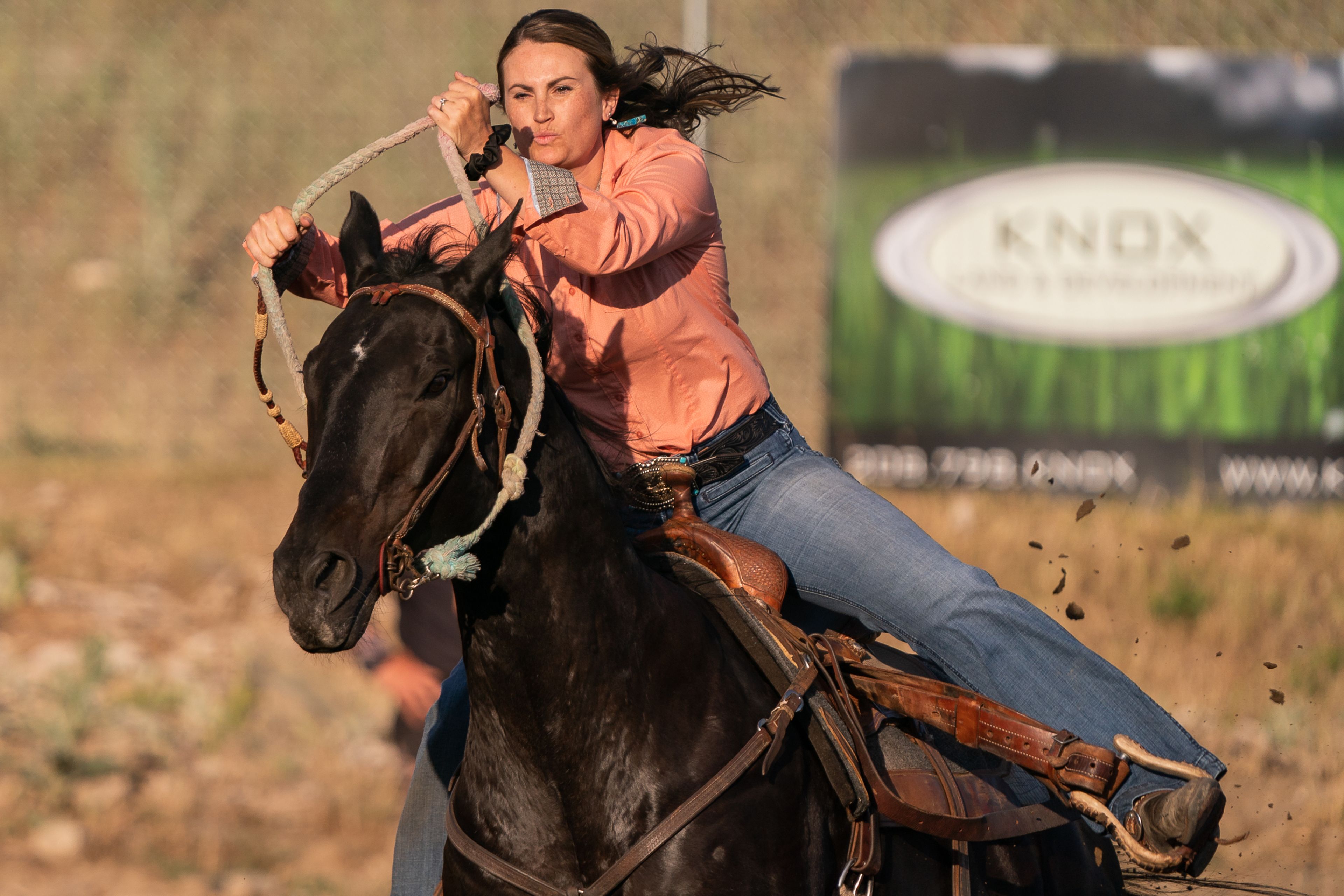 Shelby Walker takes a turn around a barrel during the Horsepower vs Horse Power event Saturday evening at ECMX Park in Lewiston.