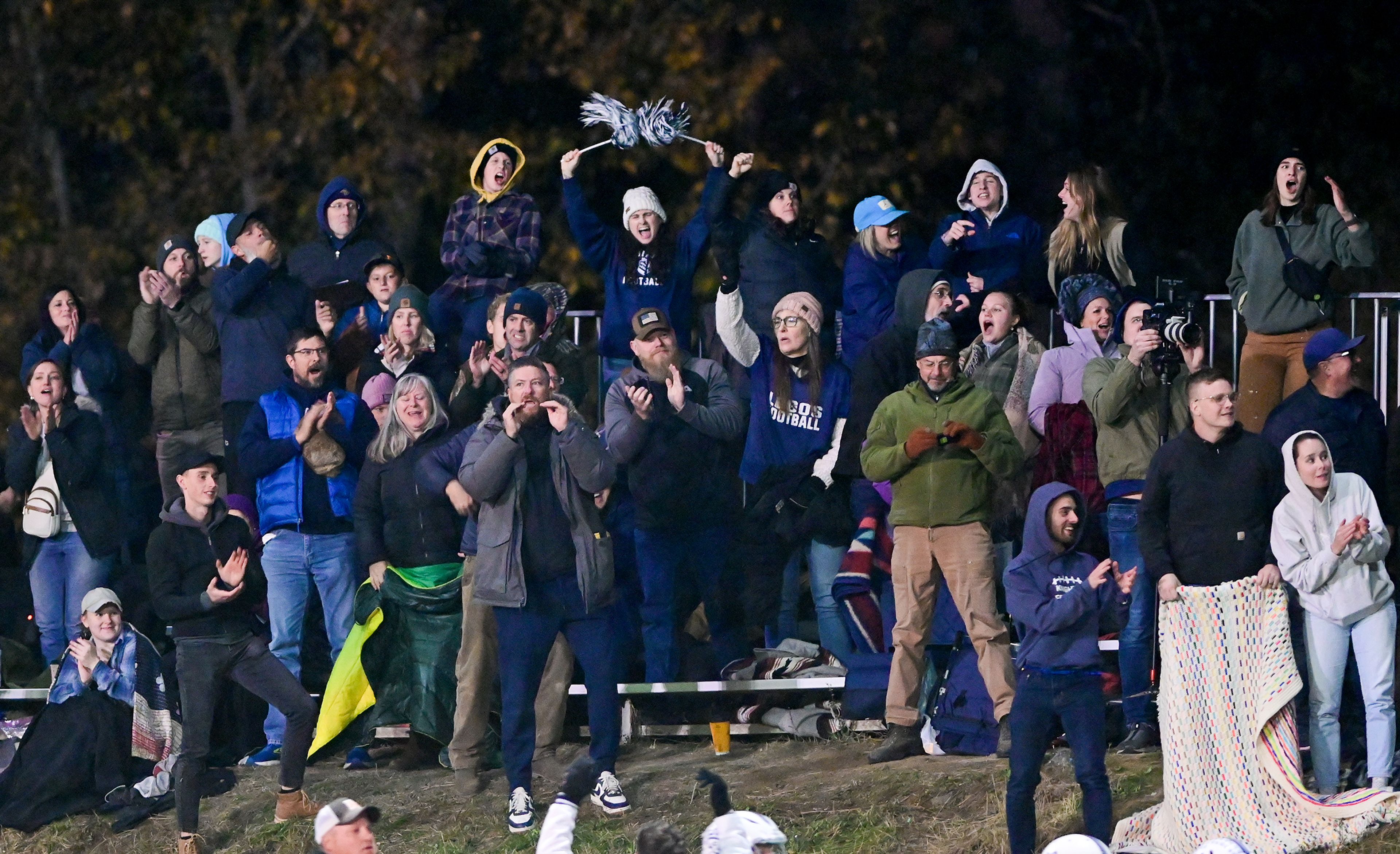 Logos fans cheer for their team after a first down against Kendrick Friday in Kendrick.,