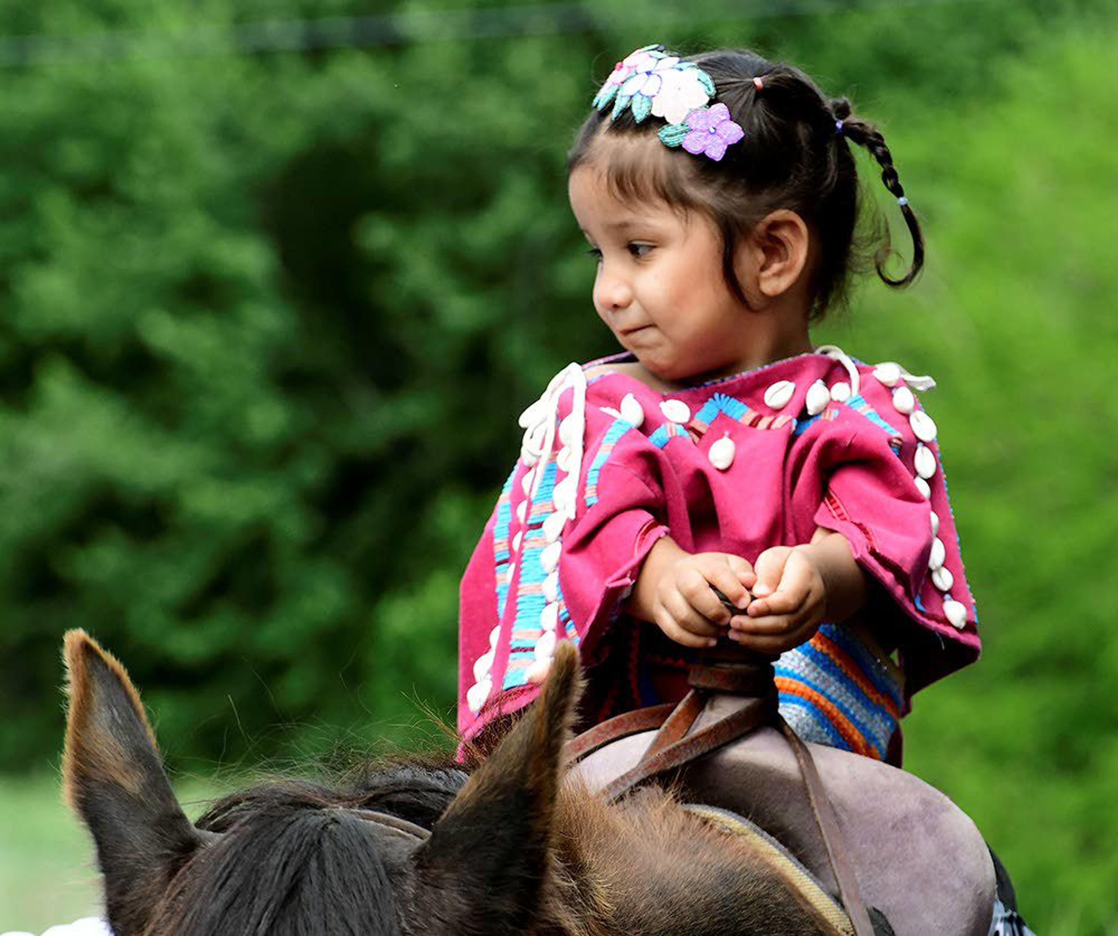 Josie Yearout, 2, spent time Saturday at the park all saddled up, and then was reluctant to let go of her new ride. Her parents are Jonelle and Jack Yearout of Sweetwater.