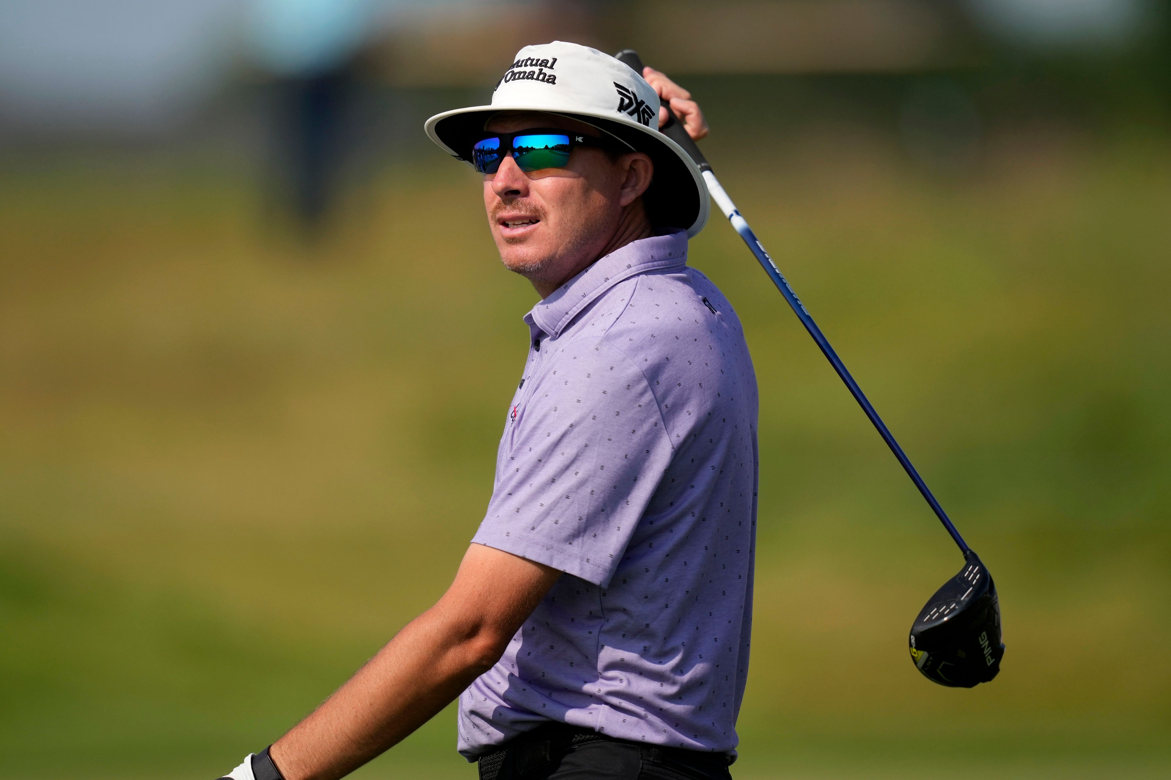 Joel Dahmen watches his tee shot on the third hole during the first round of the 3M Open golf tournament at the Tournament Players Club, Thursday, July 25, 2024, in Blaine, Minn. (AP Photo/Charlie Neibergall)