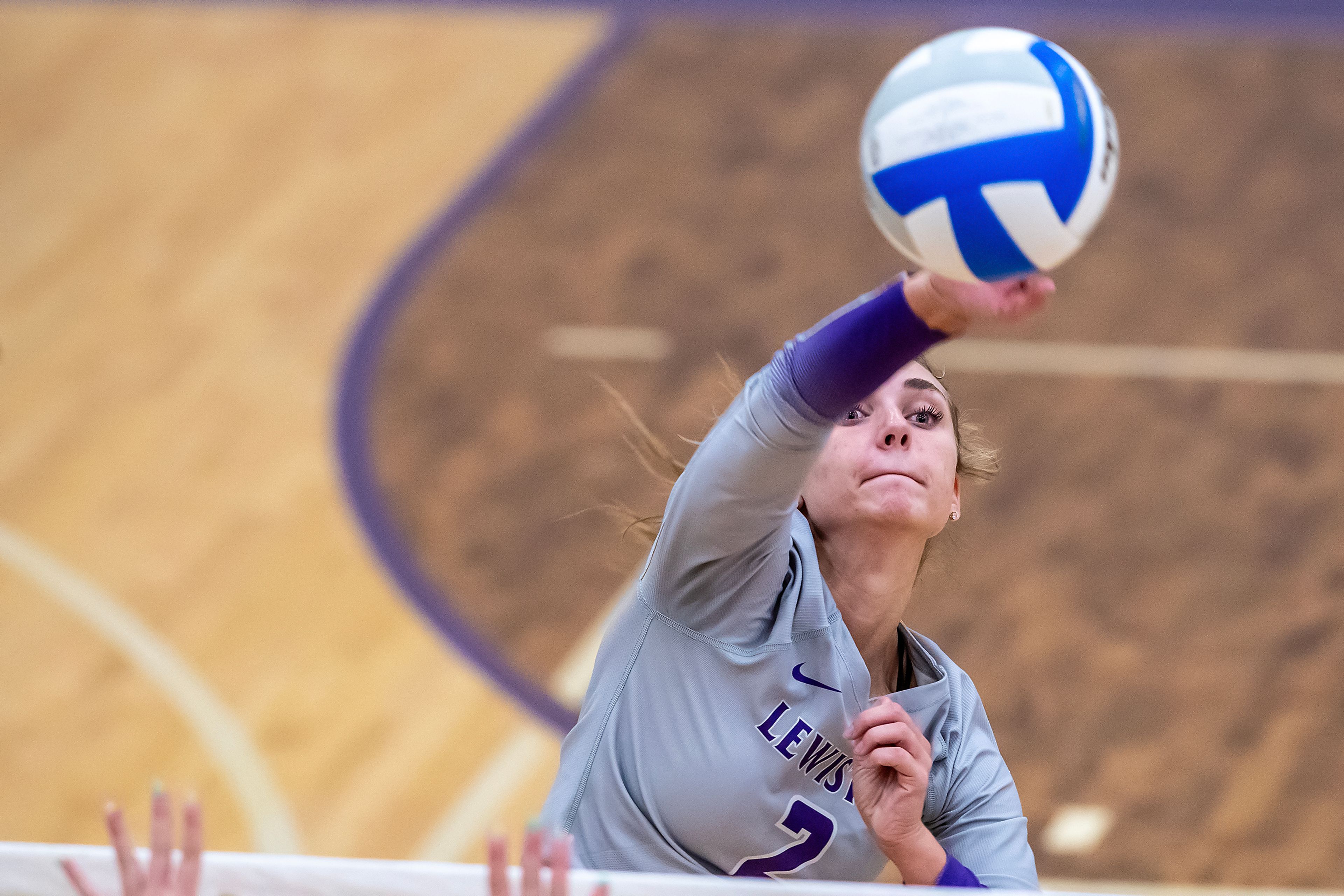 Lewiston outside hitter Anna Ready spikes the ball against Sandpoint during a volleyball game Thursday in Lewiston.,