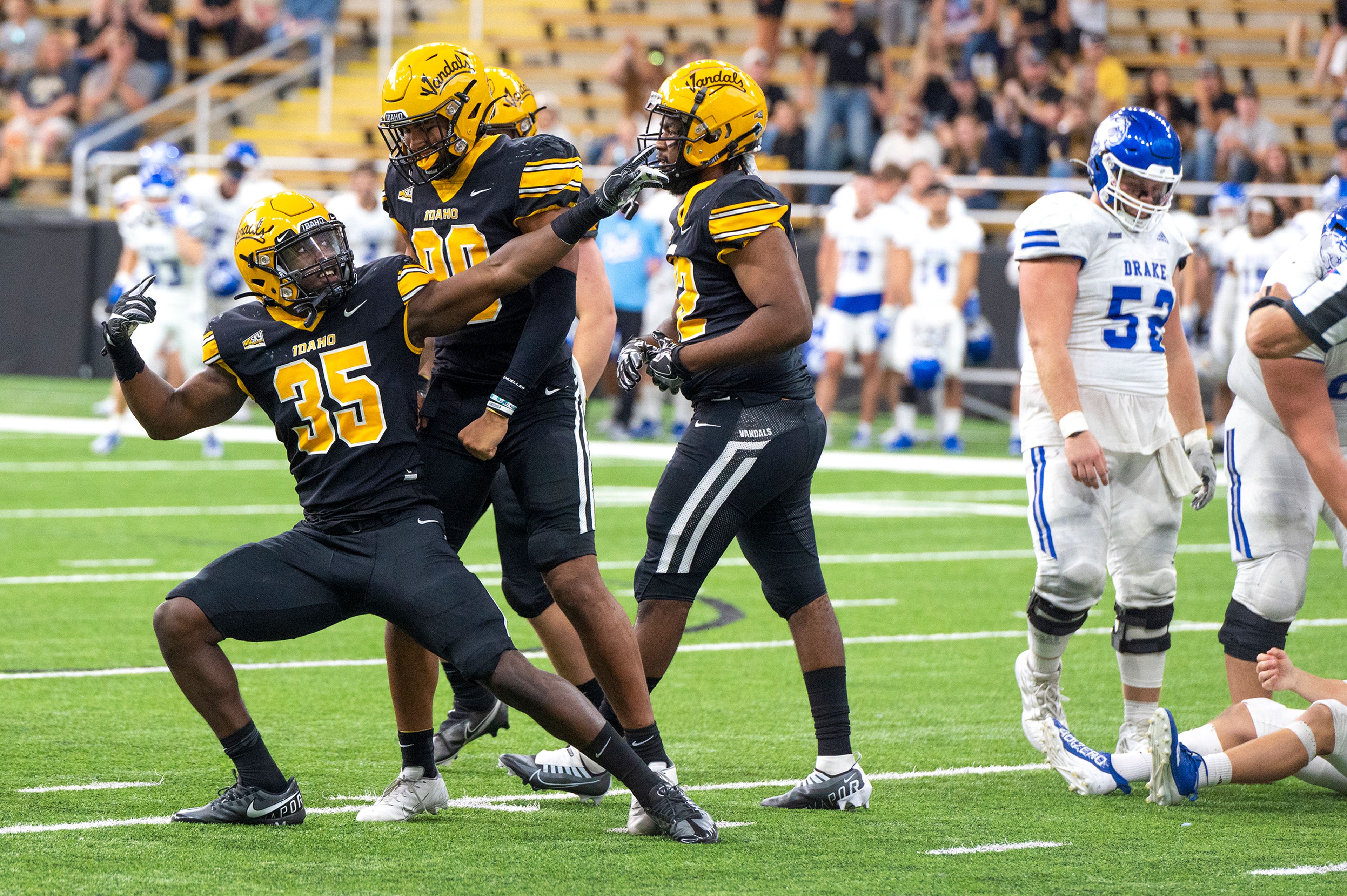 Idaho Vandals defensive lineman Kemari Bailey (35) celebrates after sacking Drake Bulldogs quarterback Ian Corwin (9) during the fourth quarter of a nonleague game Sept. 17 at the Kibbie Dome in Moscow.