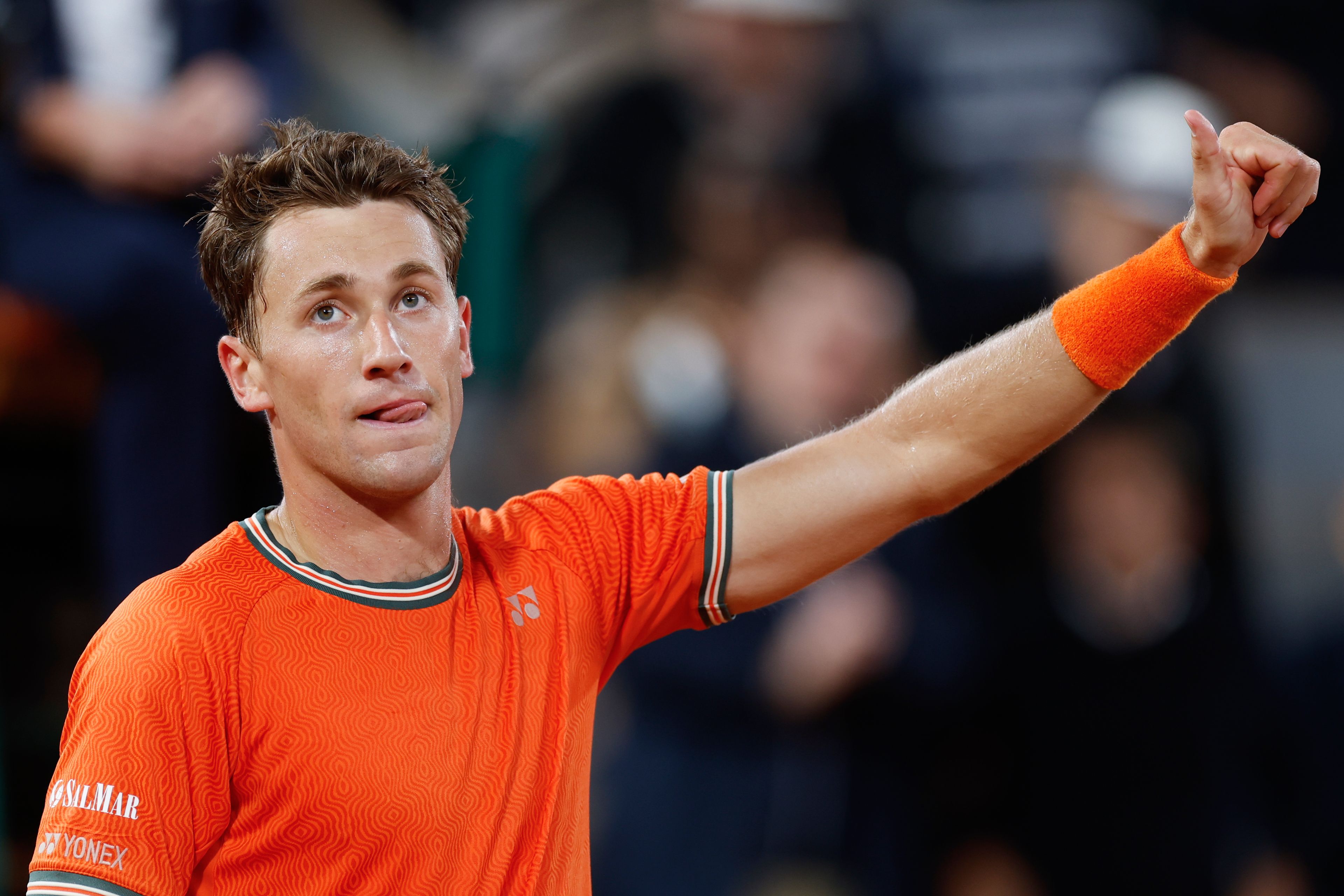 Norway's Casper Ruud celebrates winning against Brazil's Felipe Meligeni Alves at the end of their first round match of the French Open tennis tournament at the Roland Garros stadium in Paris, Tuesday, May 28, 2024.