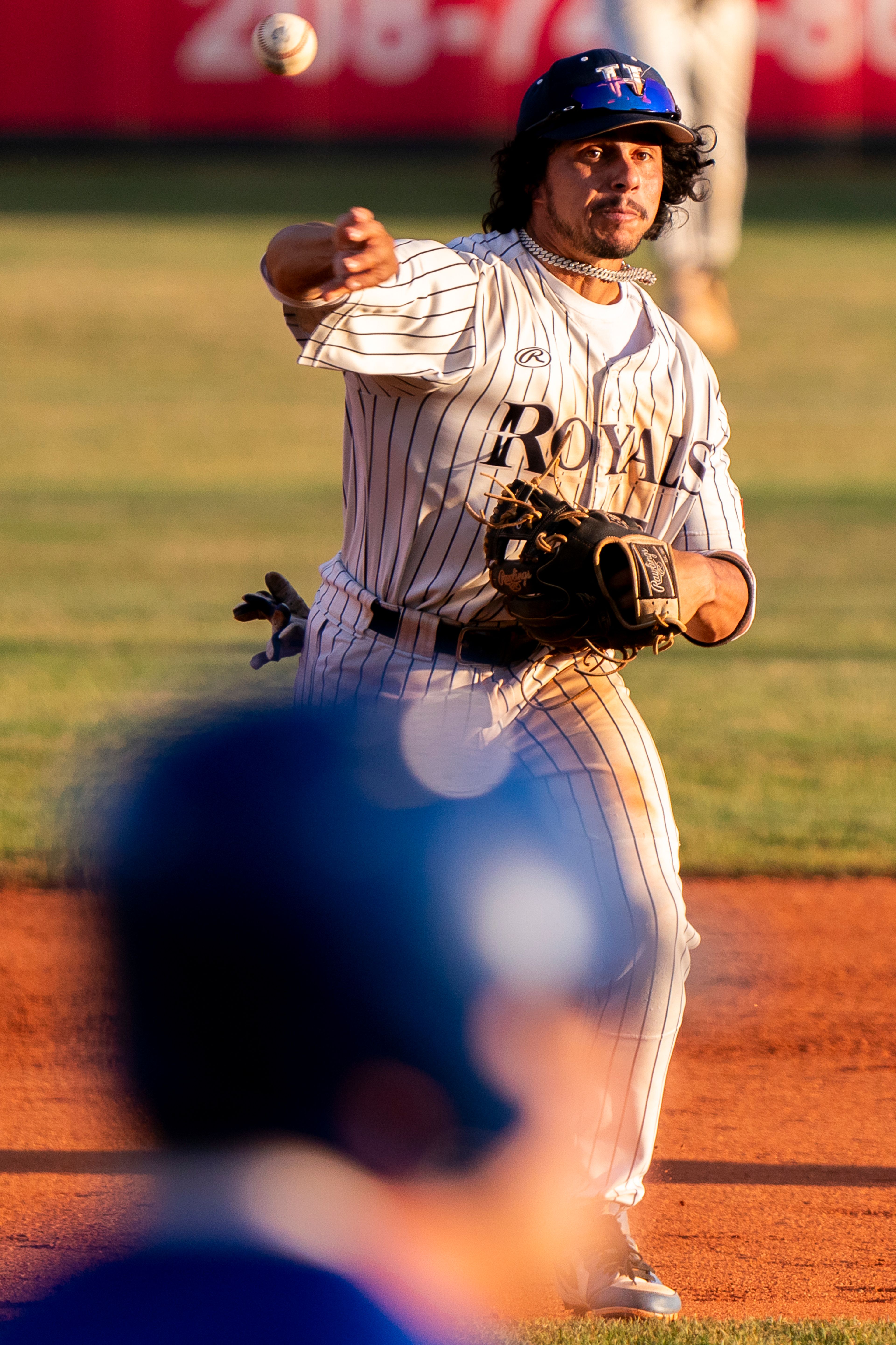 Hope International shortstop David Rivera throws the ball to first base during Game 19 of the NAIA World Series against Tennessee Wesleyan on Friday at Harris Field in Lewiston.