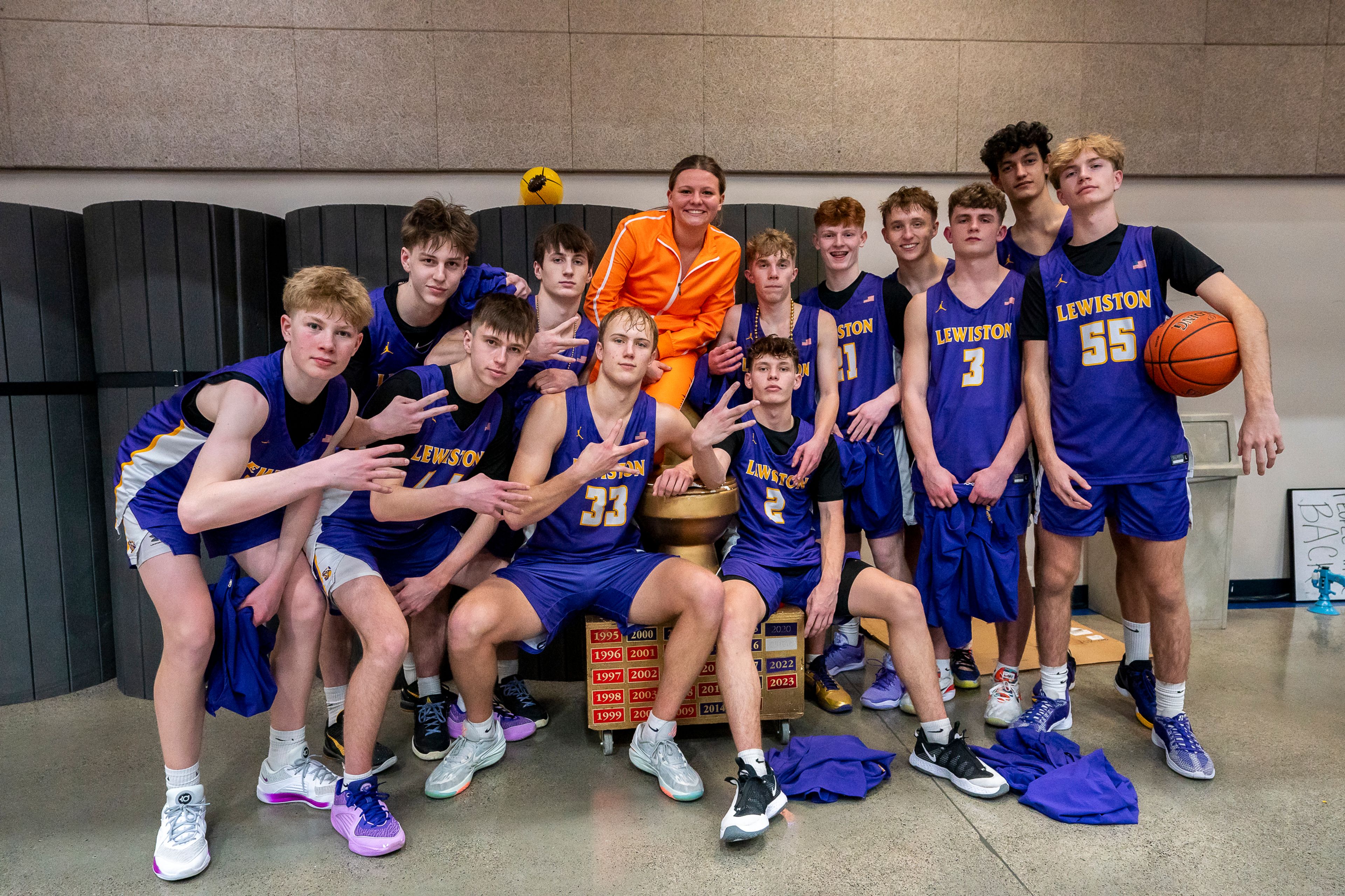 The Lewiston High School boys basketball team poses for a photo after winning the Golden Throne on Friday inside the P1FCU Activity Center in Lewiston.