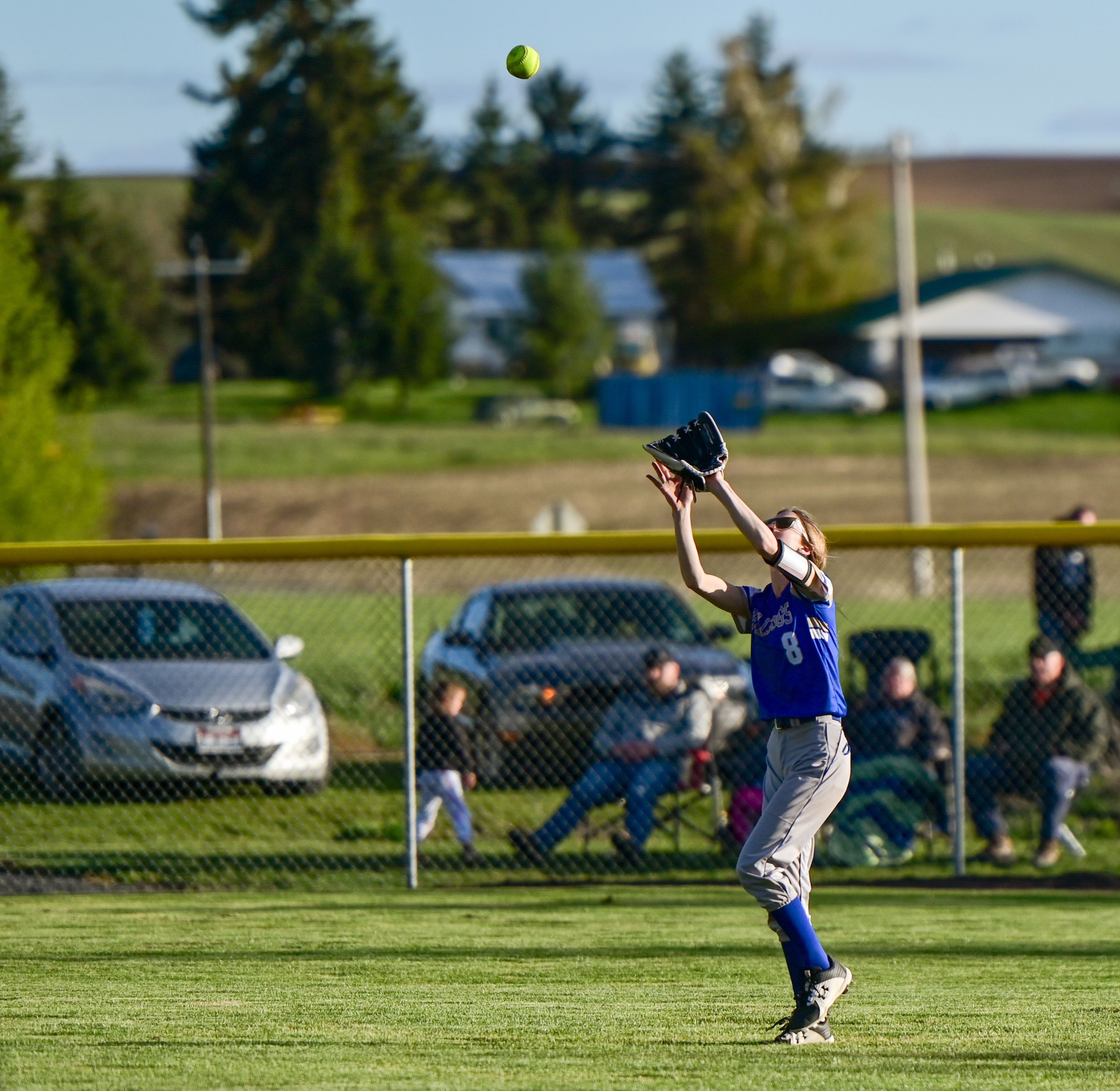 Genesee’s Brinley Lowe makes a catch in the outfield during an Idaho 2A district tournament championship game Wednesday in Genesee.