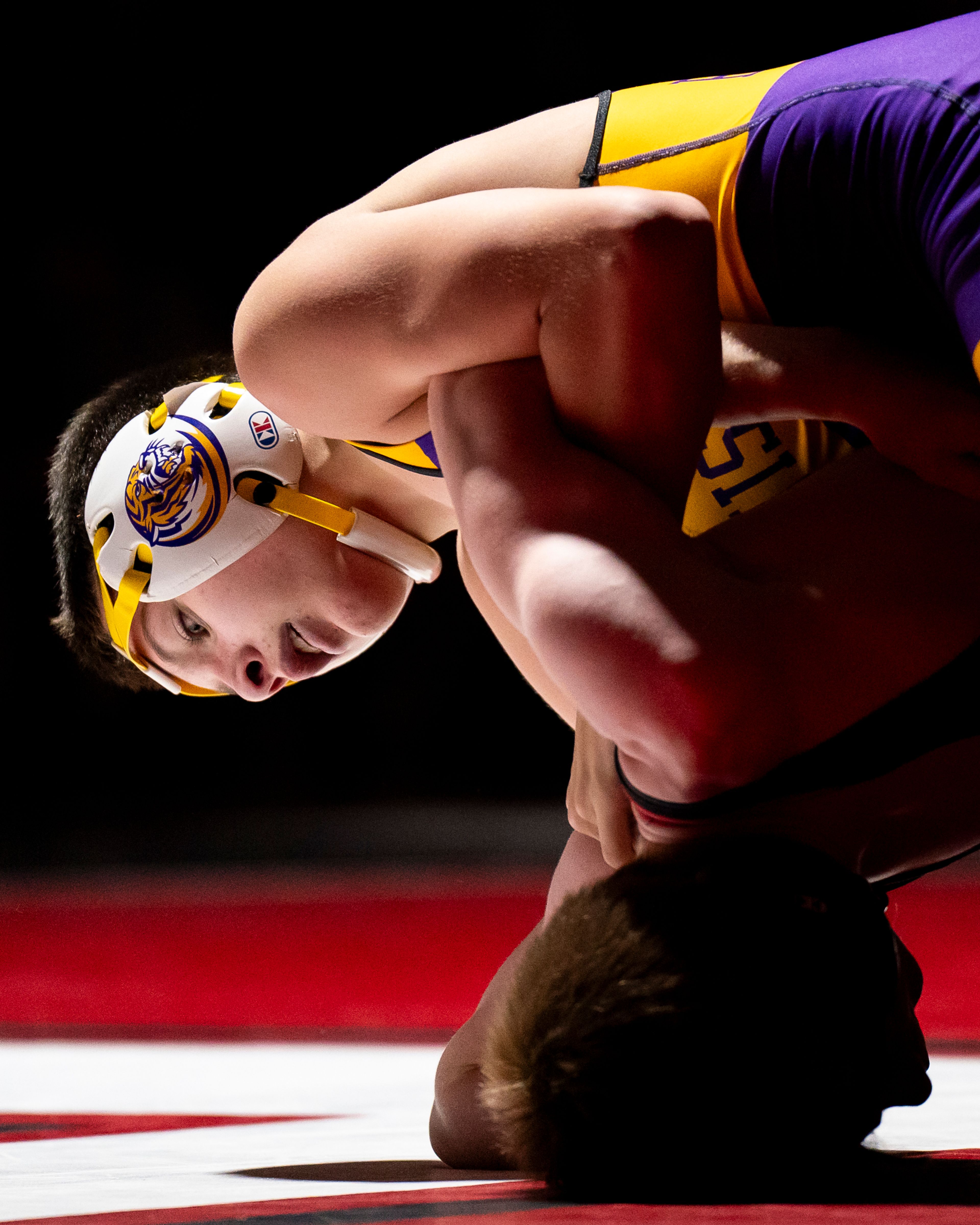 Lewiston’s Coen Roberts, left, controls Clarkston’s Colby Valdez during a 120-pound match Wednesday at Kramer Gym in Clarkston.