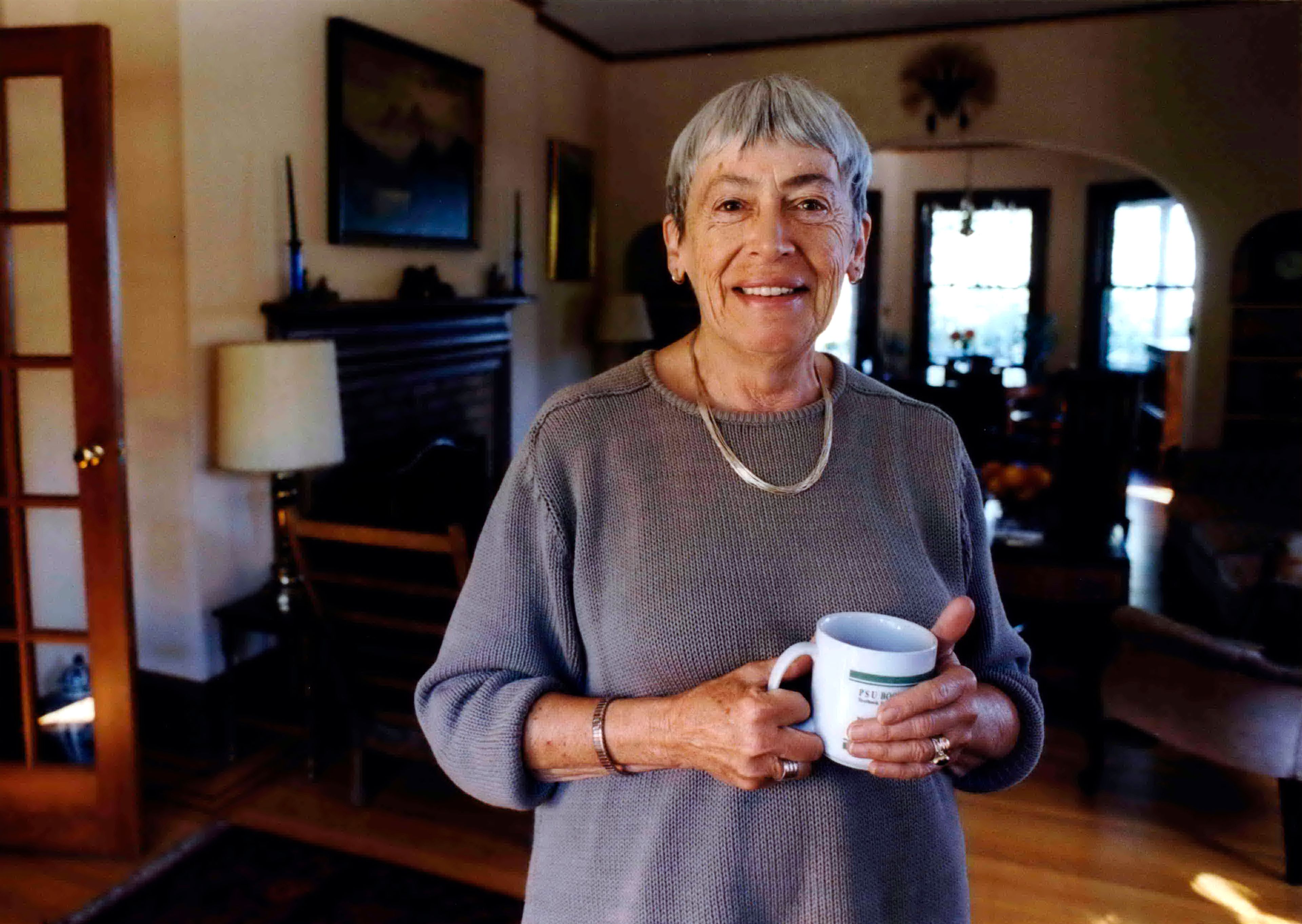 FILE - Ursula K. Le Guin, an American author of novels and children's books, poses for a photo at home on Sept. 9, 2001, in Portland, Ore. The former home of the late Le Guin is being readied to become a base for contemporary authors. Literary Arts announced Monday, June 10, 2024, that Le Guin’s family had donated their three-story house to the Portland, Oregon-based community nonprofit for what will become the Ursula K. Le Guin Writers Residency.