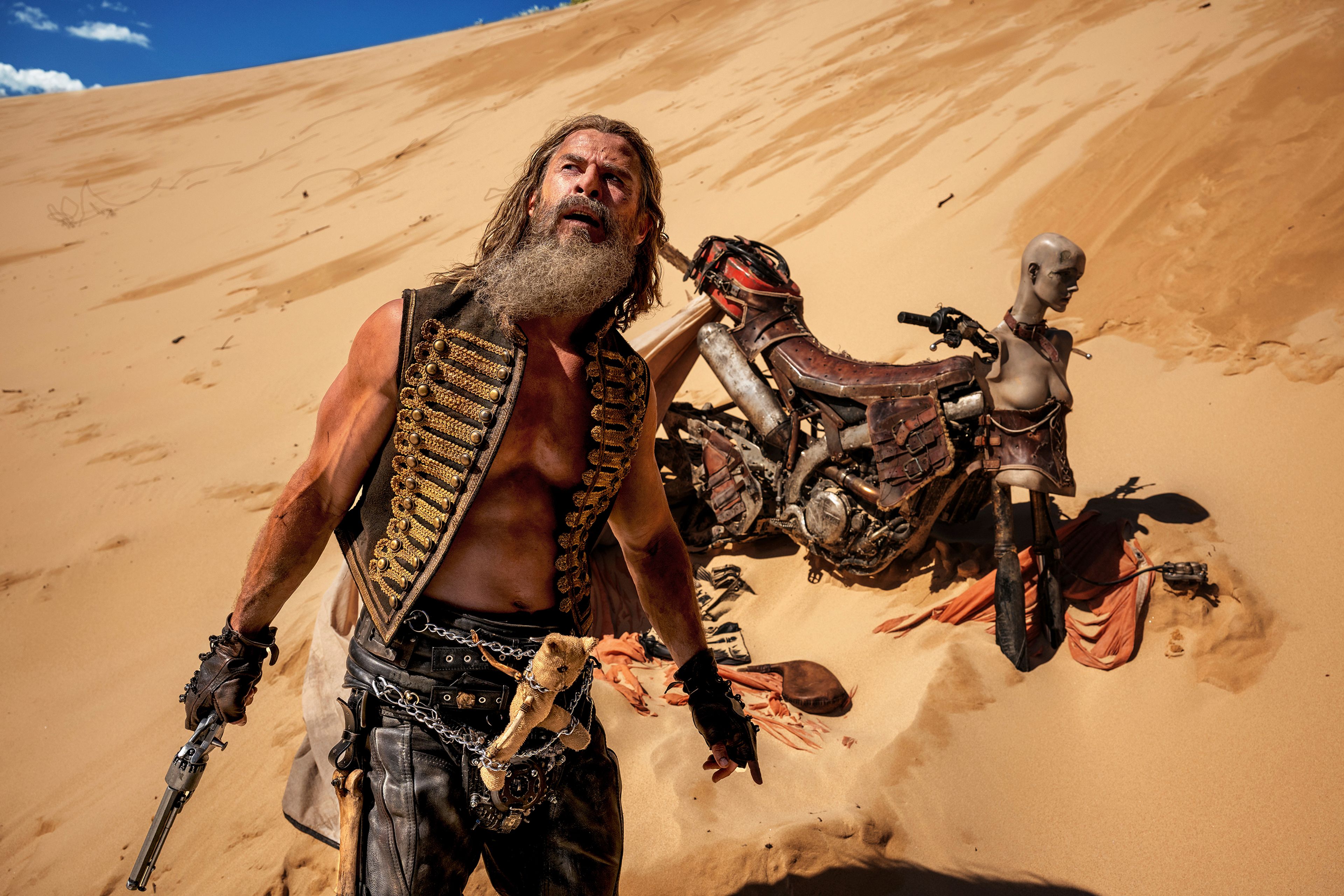 This image released by Warner Bros. Pictures shows Chris Hemsworth in a scene from "Furiosa: A Mad Max Saga."