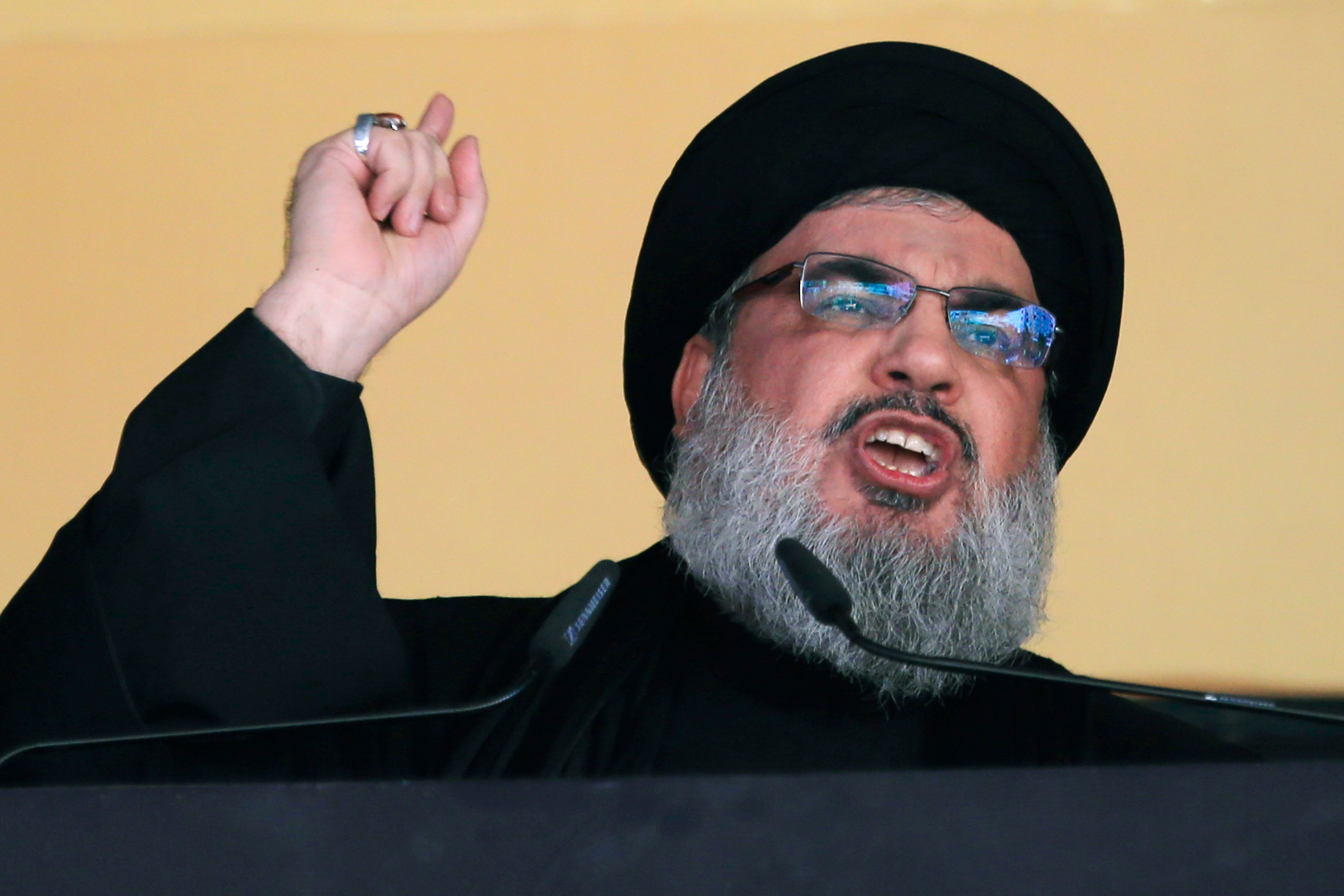 FILE - In this Oct. 24, 2015 file photo, Hezbollah leader Sheik Hassan Nasrallah addresses a crowd during the holy day of Ashoura, in a southern suburb of Beirut, Lebanon. (AP Photo/Hassan Ammar, File)