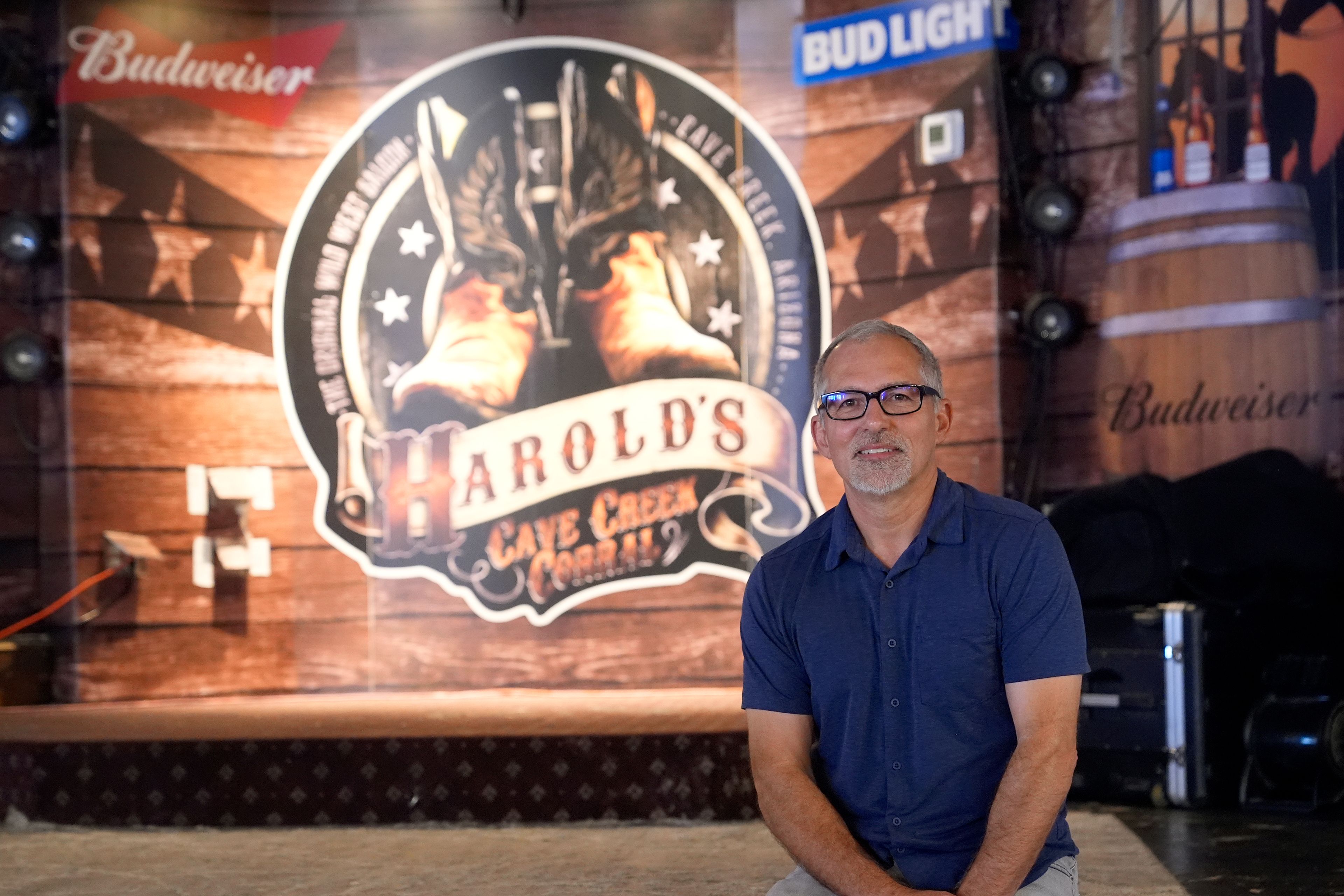 Dan Piacquadio, owner of Harold's Cave Creek Corral, pauses at the restaurant's concert stage as he awaits the results of the upcoming election results regarding Arizona Prop 138 on minimum wage Thursday, Oct. 3, 2024, in Cave Creek, Ariz. (AP Photo/Ross D. Franklin)