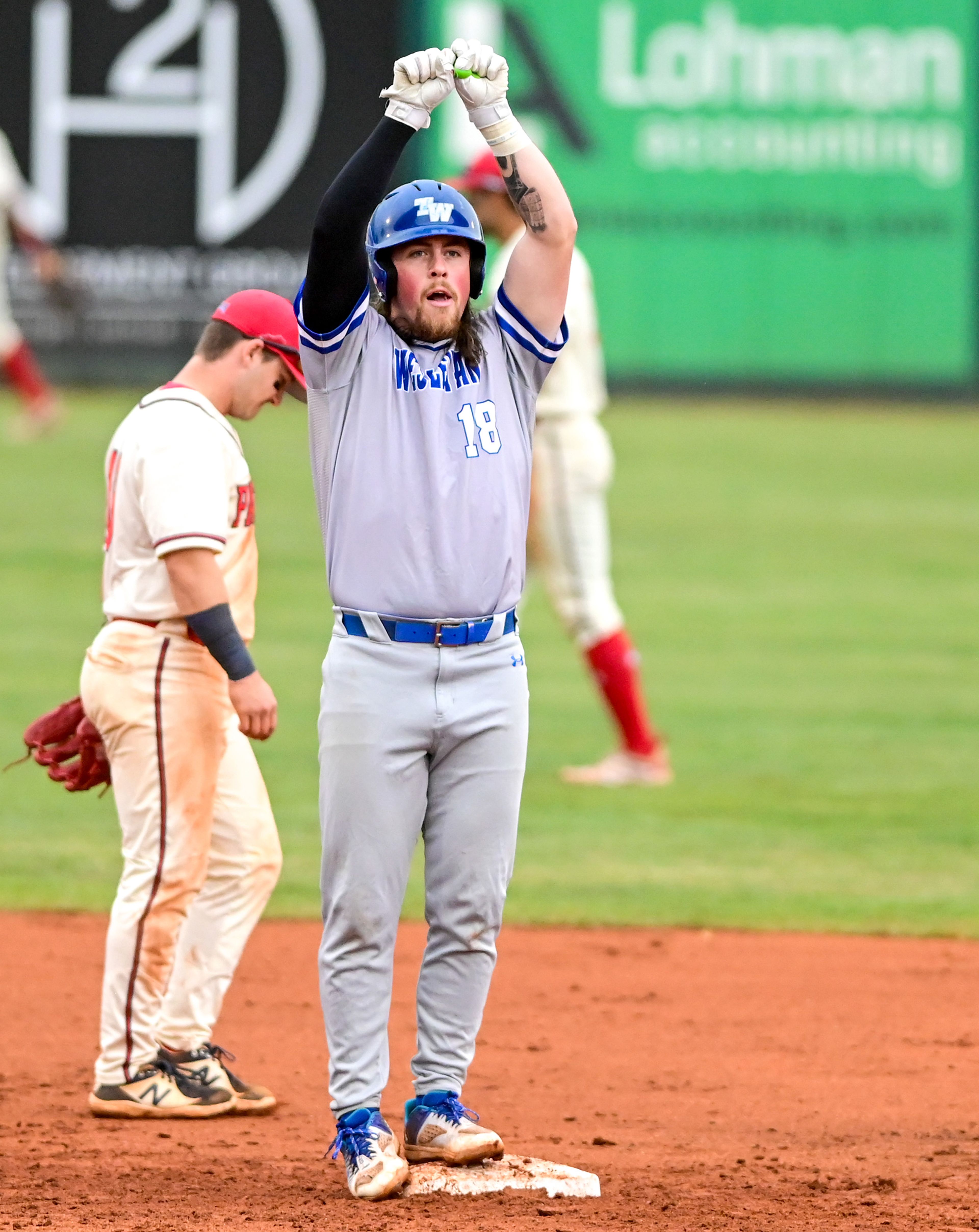 Tennessee Wesleyan’s Evan Magill celebrates a run to second base during a game against the Cumberlands on the opening day of the NAIA World Series at Harris Field in Lewiston on Friday.